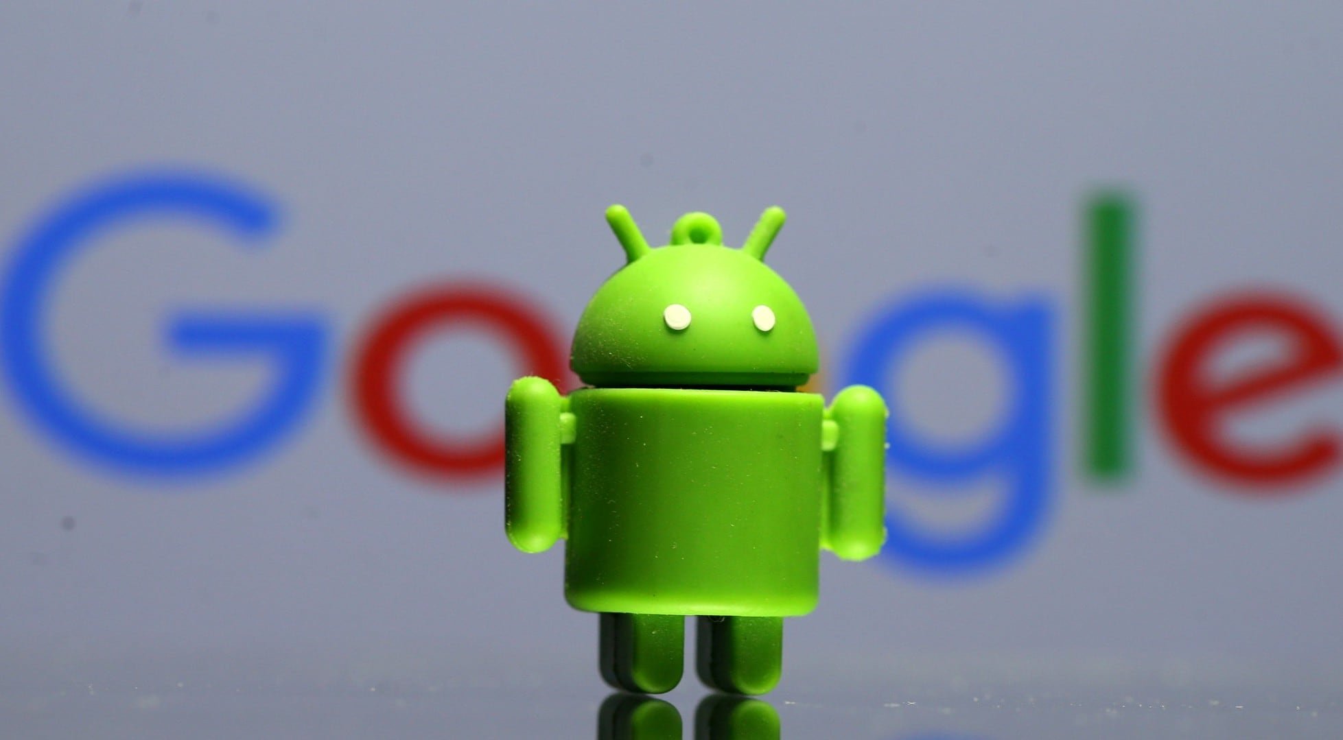 FILE PHOTO - A 3D printed Android mascot Bugdroid is seen in front of a Google logo in this illustration taken July 9, 2017. Picture taken July 9, 2017. REUTERS/Dado Ruvic/Illustration/r/File Photo