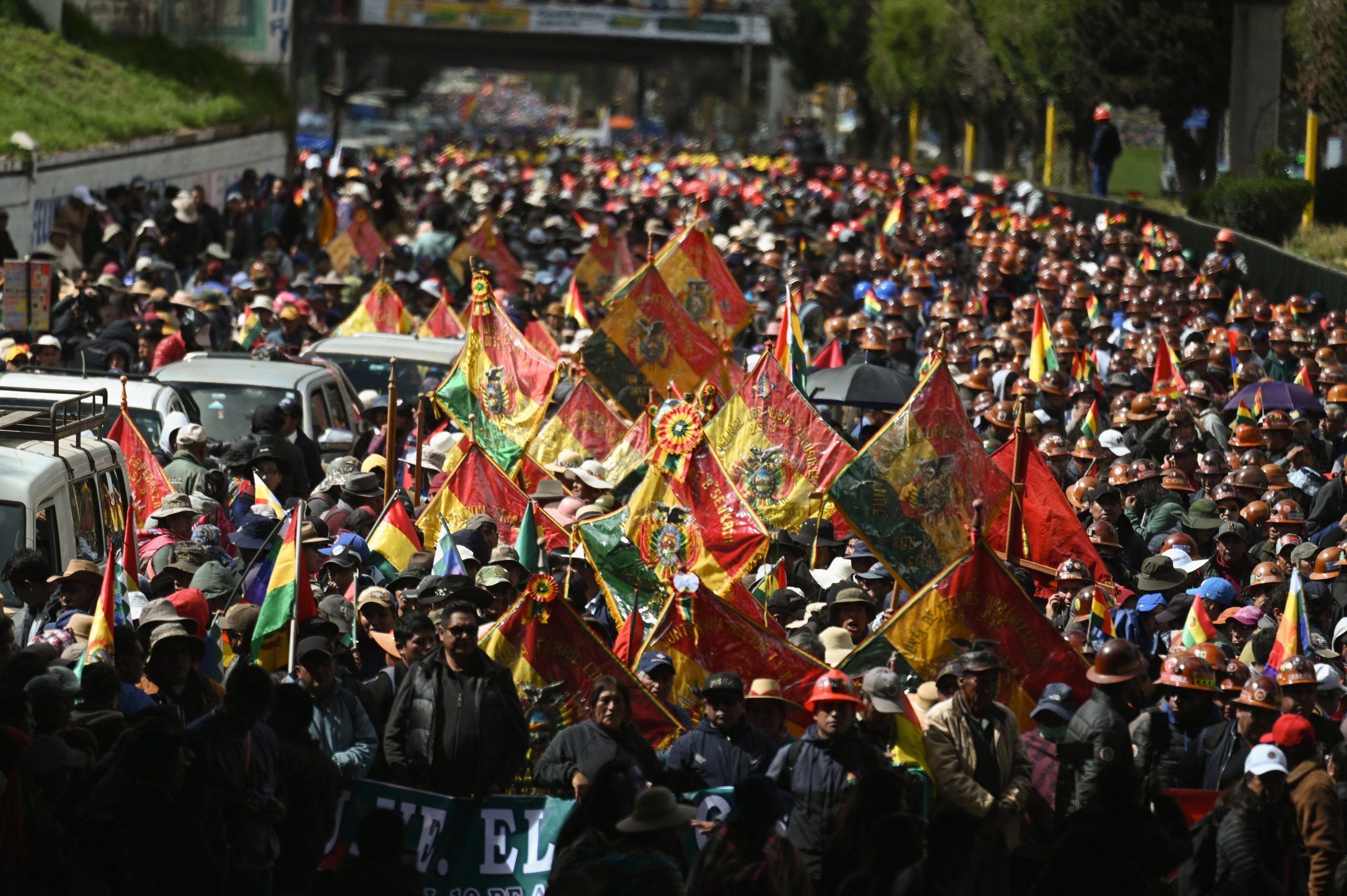 Miners affiliated with the Central Obrera Boliviana (COB) and social organizations take part in a protest march called