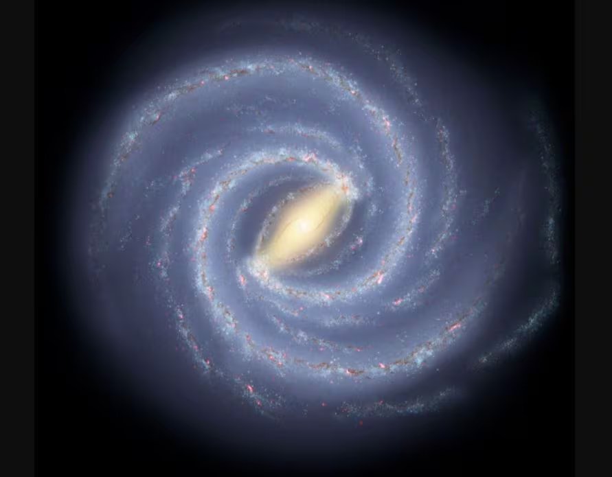 La materia oscura actúa como un andamiaje gravitatorio, formando halos donde el gas se enfría y se crean galaxias (NASA/JPL-CALTECH/R. HURT (SSC/CALTECH))
