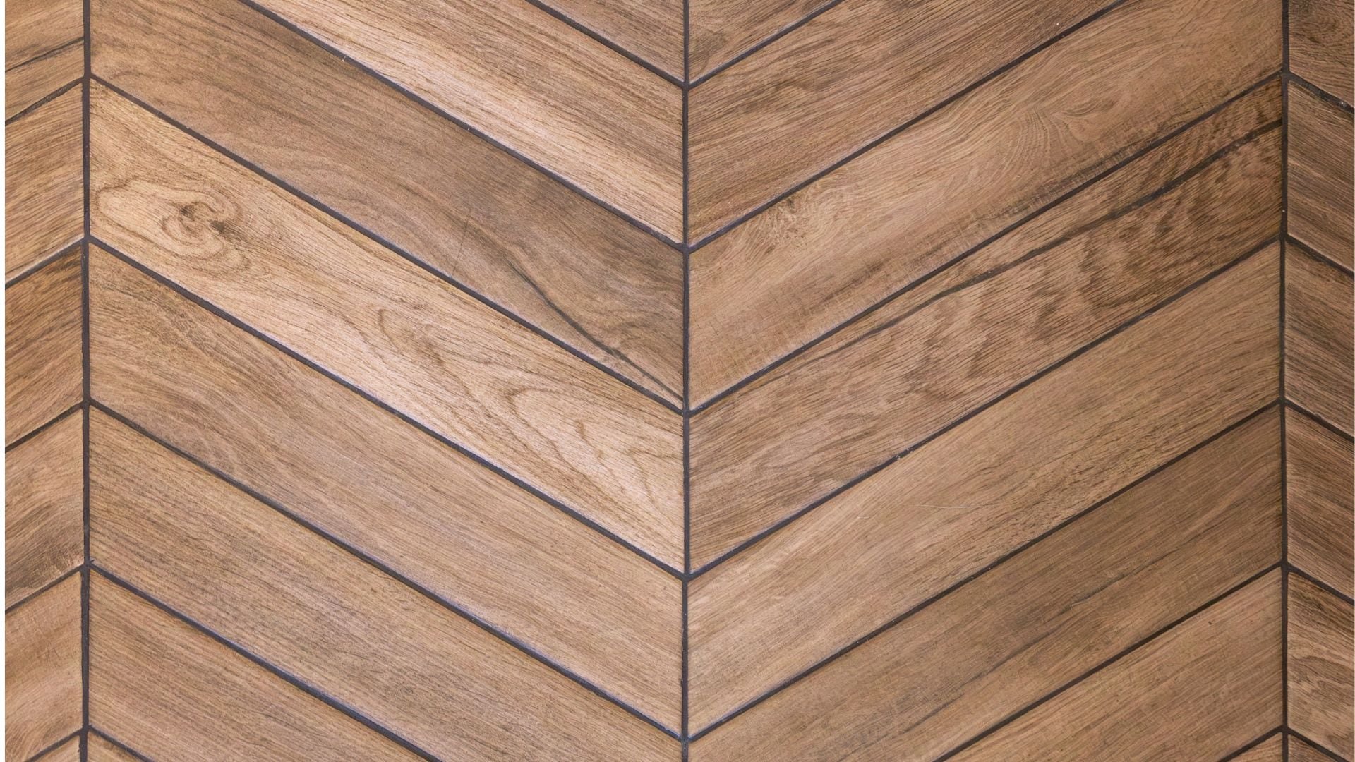 Suelo laminado en espiga. (Freepik)