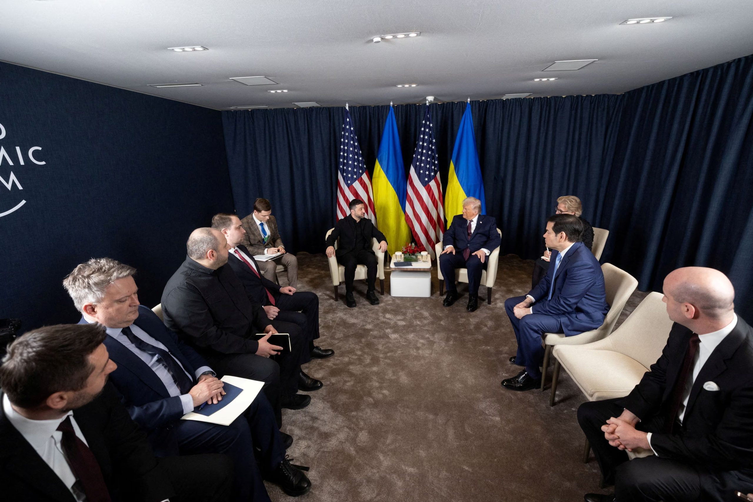 Ukraine's President Volodymyr Zelenskiy and U.S. President Donald Trump attend a meeting at the sidelines of the 56th annual World Economic Forum (WEF), in Davos, Switzerland, January 22, 2026. Ukrainian Presidential Press Service/Handout via REUTERS ATTENTION EDITORS - THIS IMAGE HAS BEEN SUPPLIED BY A THIRD PARTY.