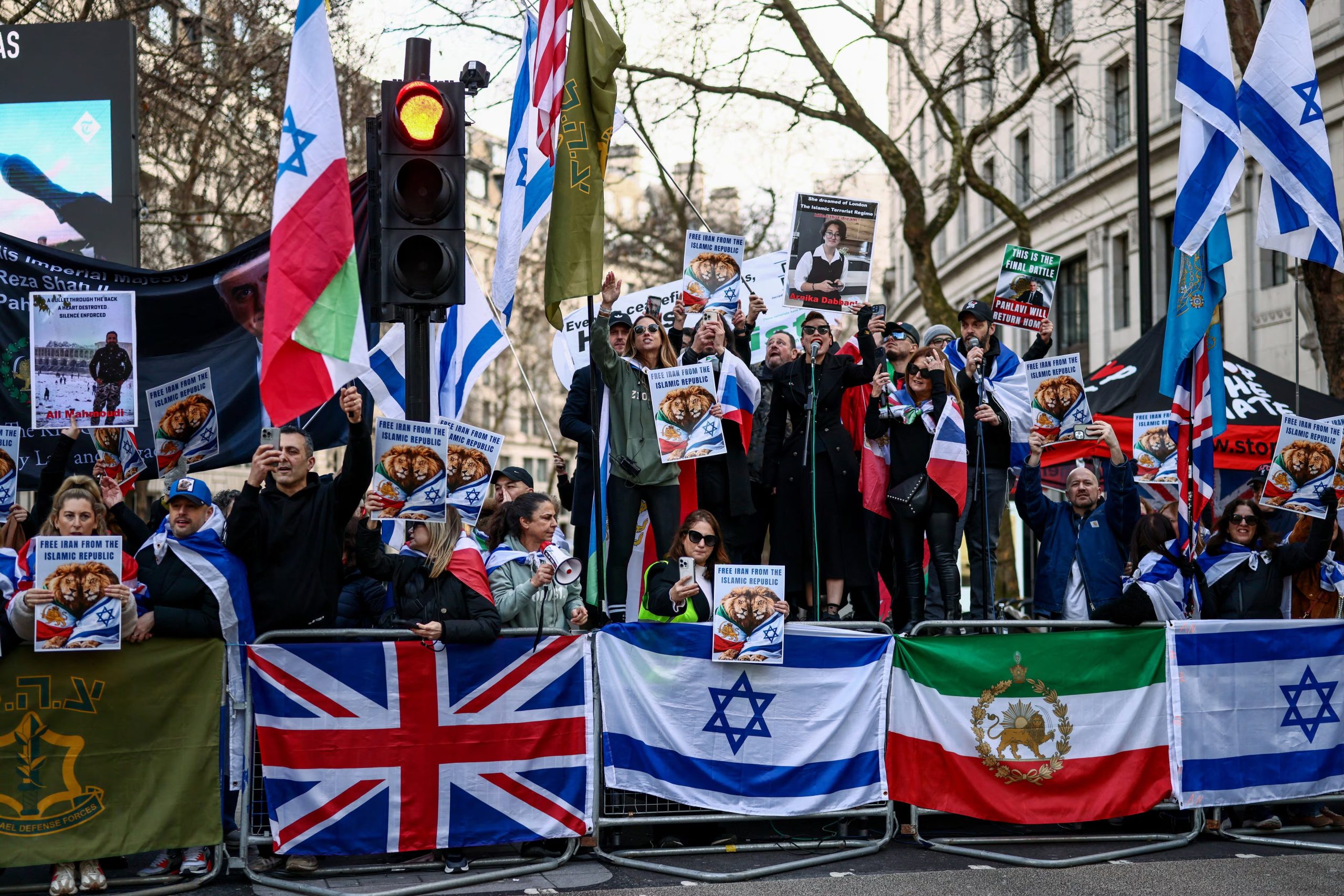 Counter-protesters carry Union Jack, Israeli and 