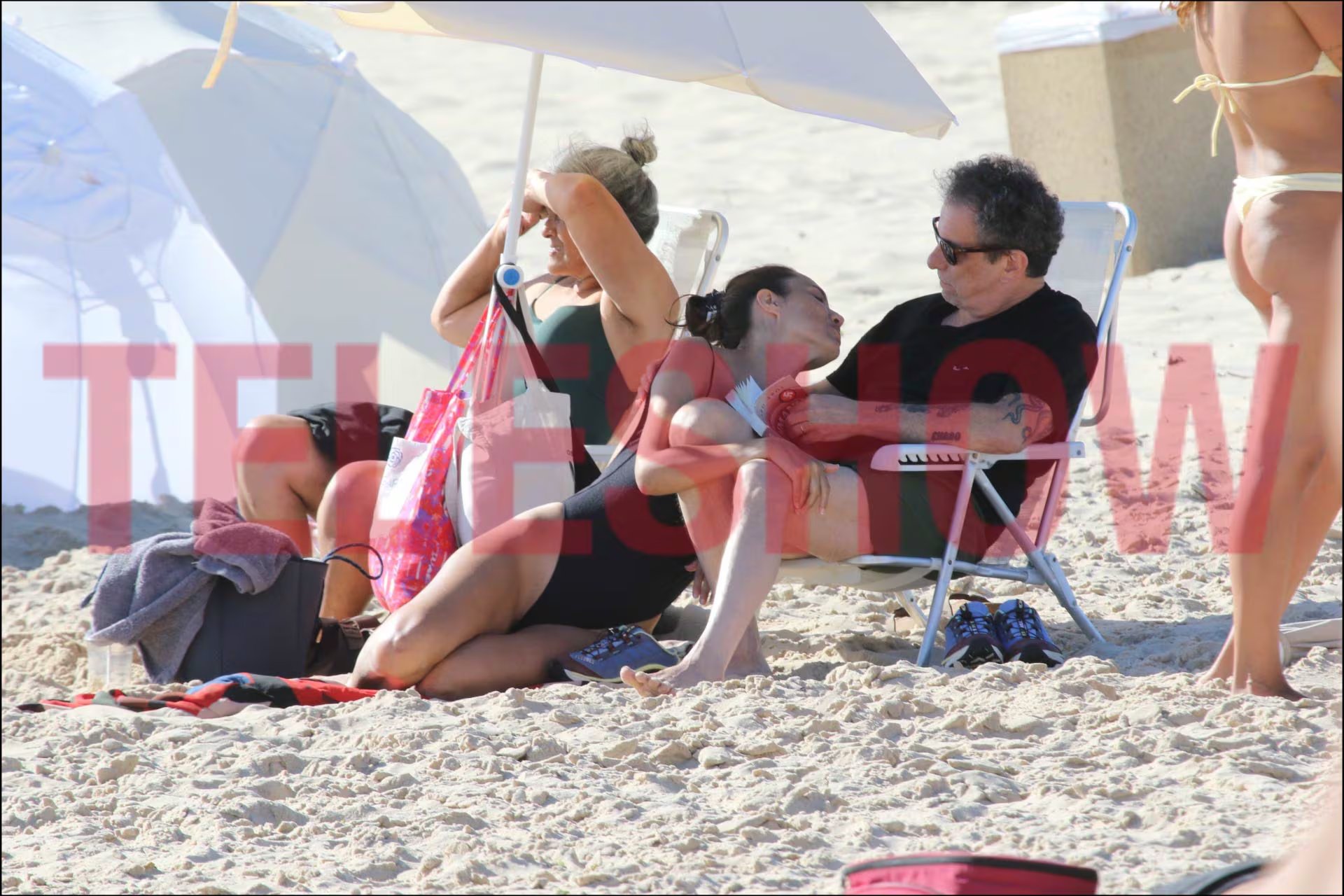 En un momento de afecto, Natalí se recostó en el regazo de Calamaro