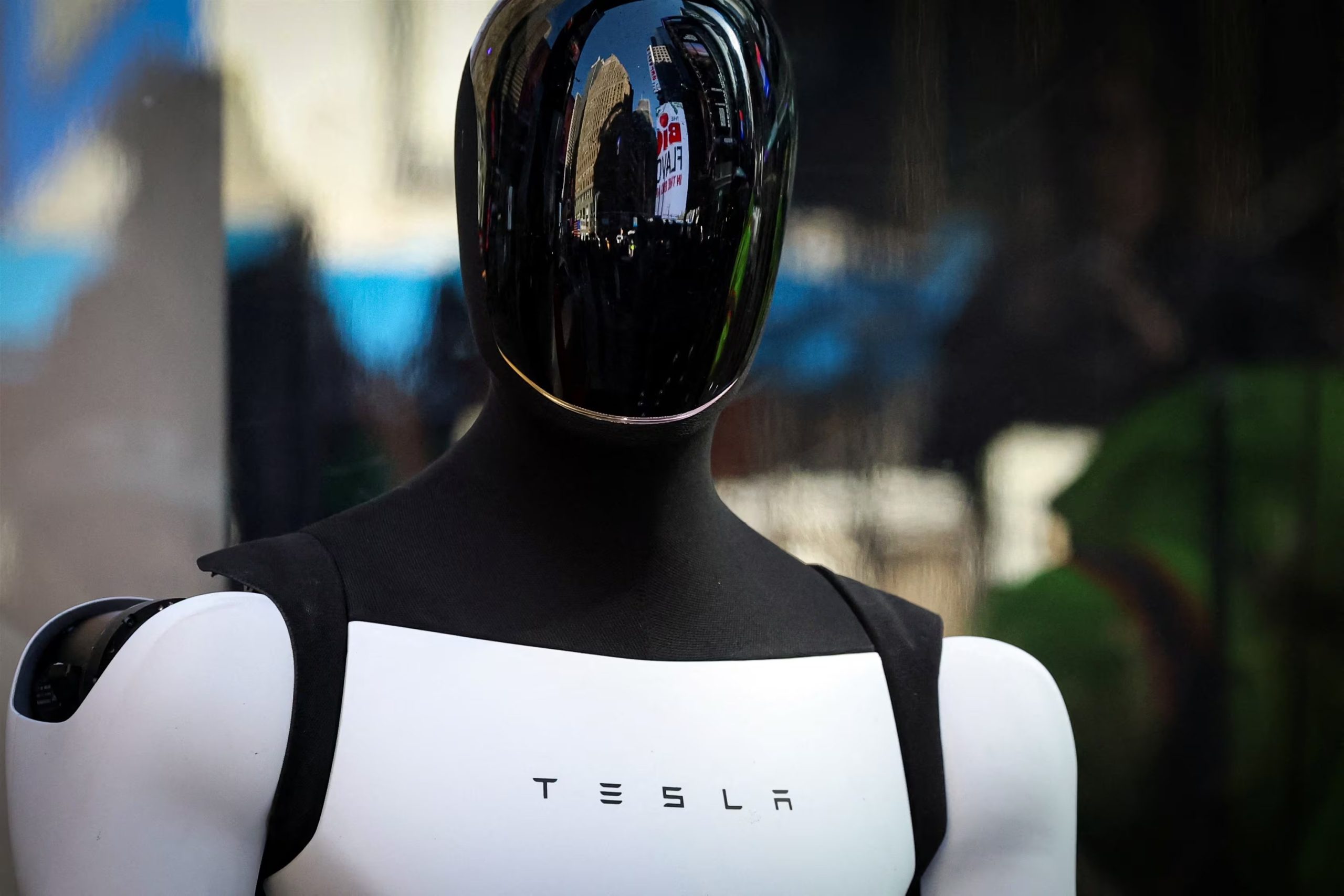 A Tesla Optimus robot makes an appearance outside the Nasdaq Market site in New York City, U.S., October 27, 2025. REUTERS/Brendan McDermid