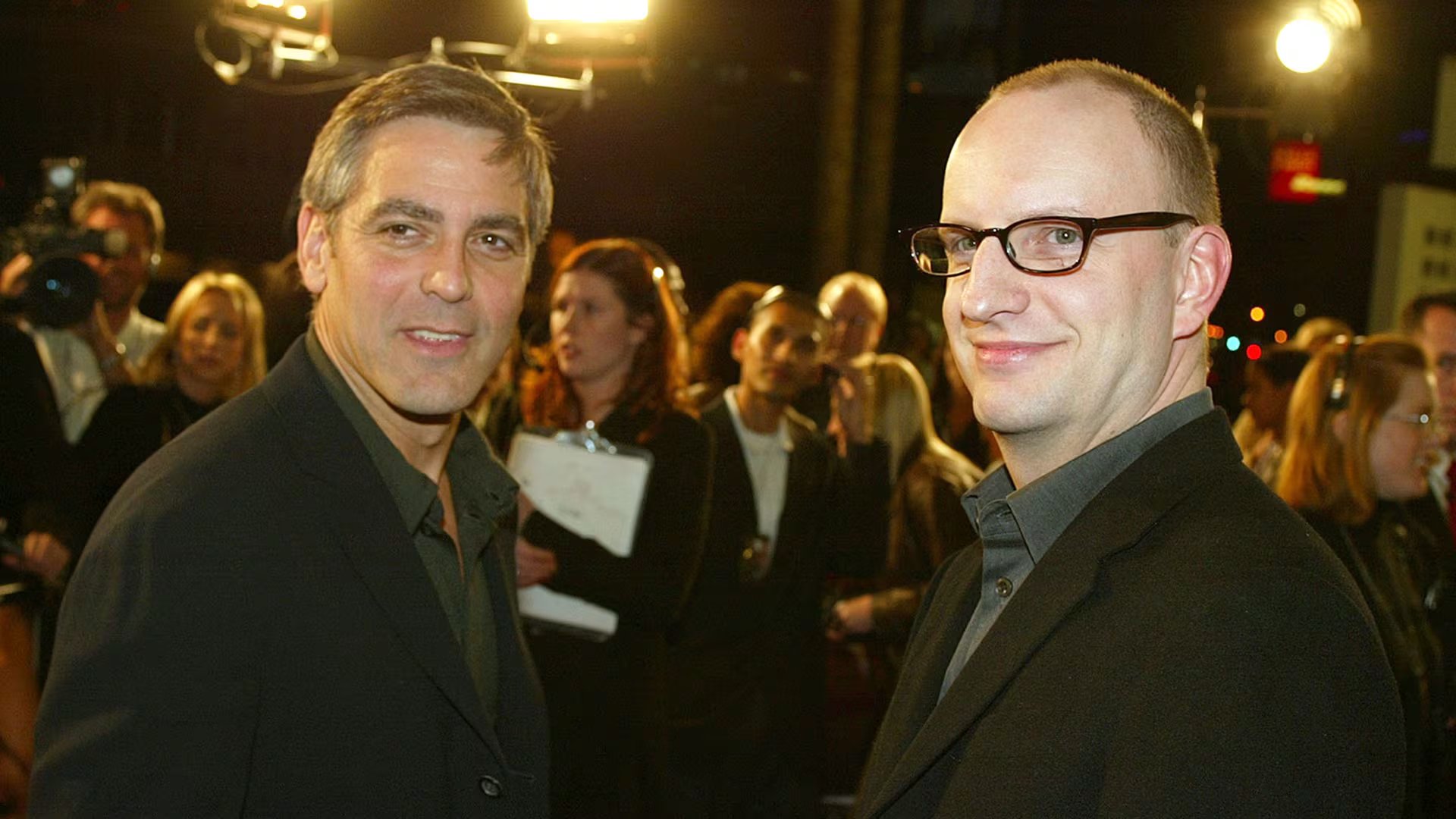 George Clooney junto al director Steven Soderbergh. Photo by Kevin Winter/ImageDirect.