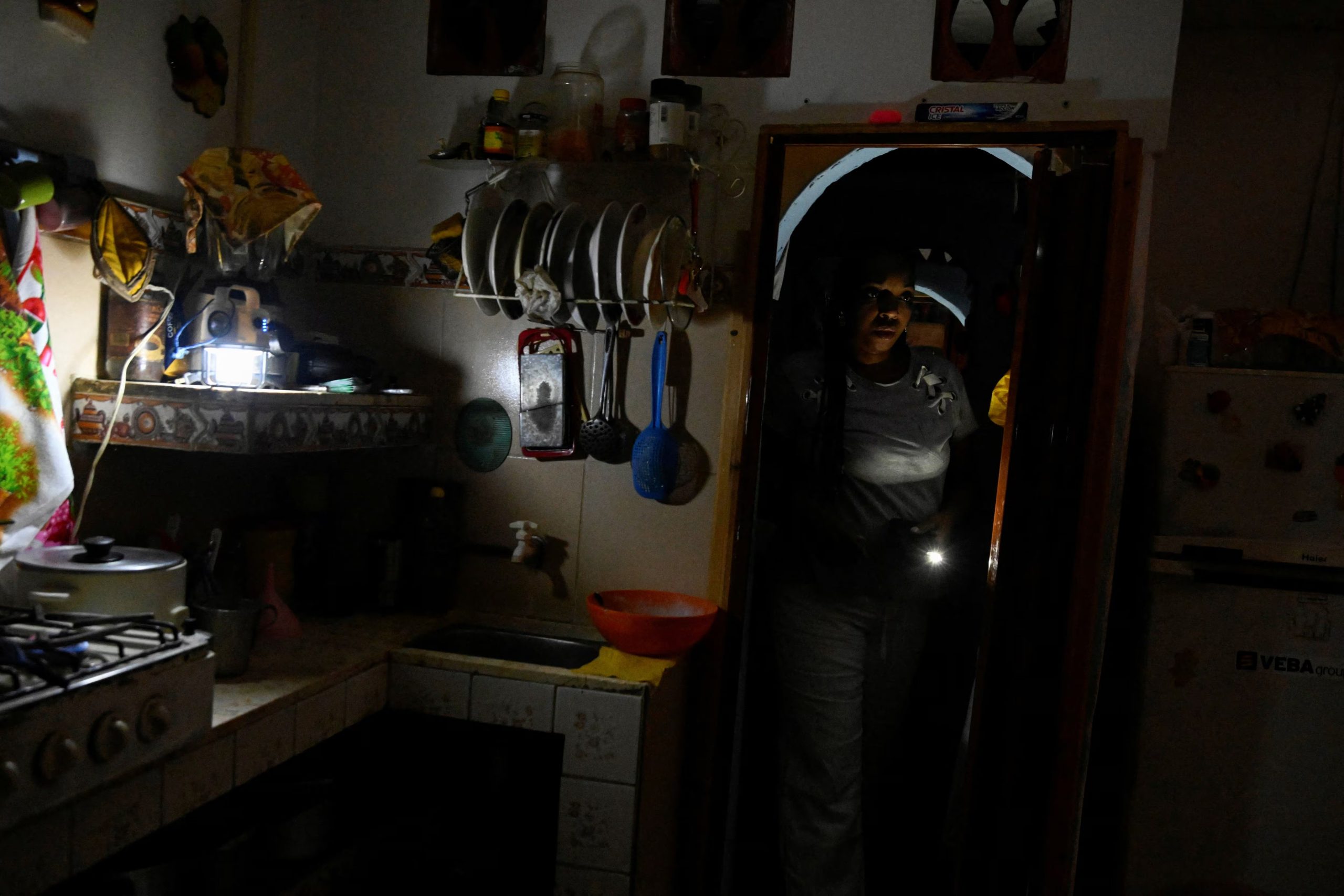 Bakery clerk Yaimara Ofarill prepares to leave for work in Havana, as Cubans from all walks of life hunker into survival mode, navigating seemingly interminable blackouts and soaring prices for food, fuel, and transport, while the United States threatens a stranglehold on the communist-run nation, Cuba, January 30, 2026. REUTERS/Norlys Perez