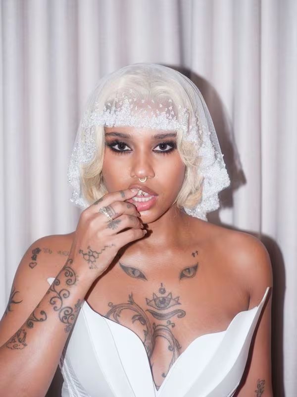 En conversación con Infobae, en 2025, Tokischa revela que su estilo provocador y su comodidad con su cuerpo son parte esencial de su arte - crédito cortesía AuroraAnthony