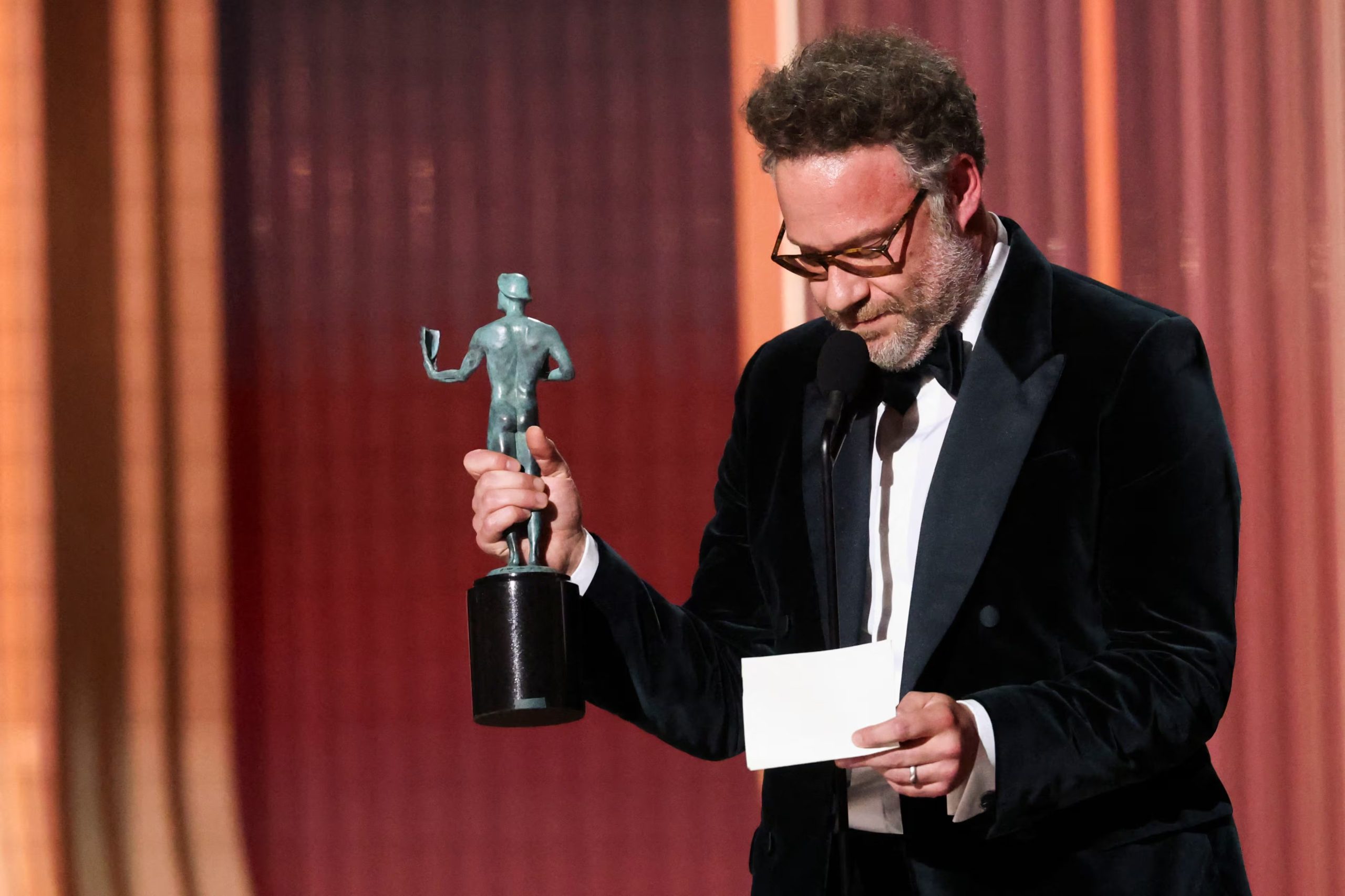 Seth Rogen accepts the Outstanding Performance By A Female Actor In A Comedy Series award on behalf of Catherine O'Hara for 