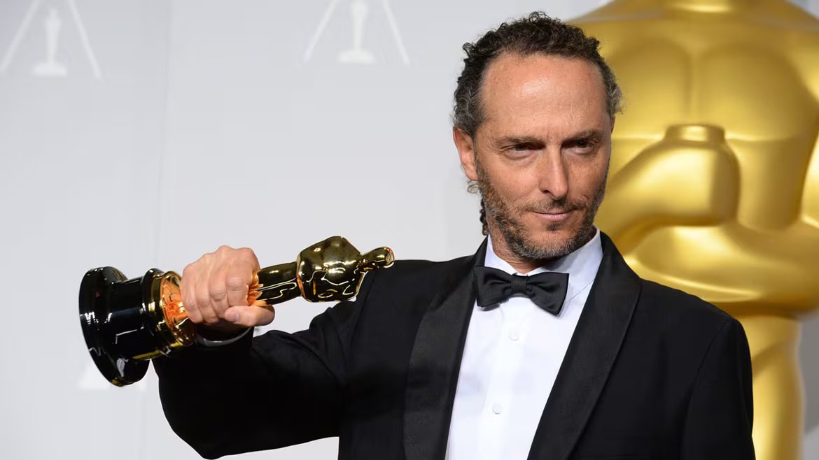 Emmanuel Lubezki poses in the press room with the award for best cinematographer of the year for 