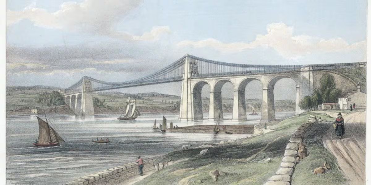 La construcción del puente de Menai respondió a la necesidad de integrar Irlanda y Gran Bretaña tras la constitución del Reino Unido en los primeros años del siglo XIX (Wikipedia)