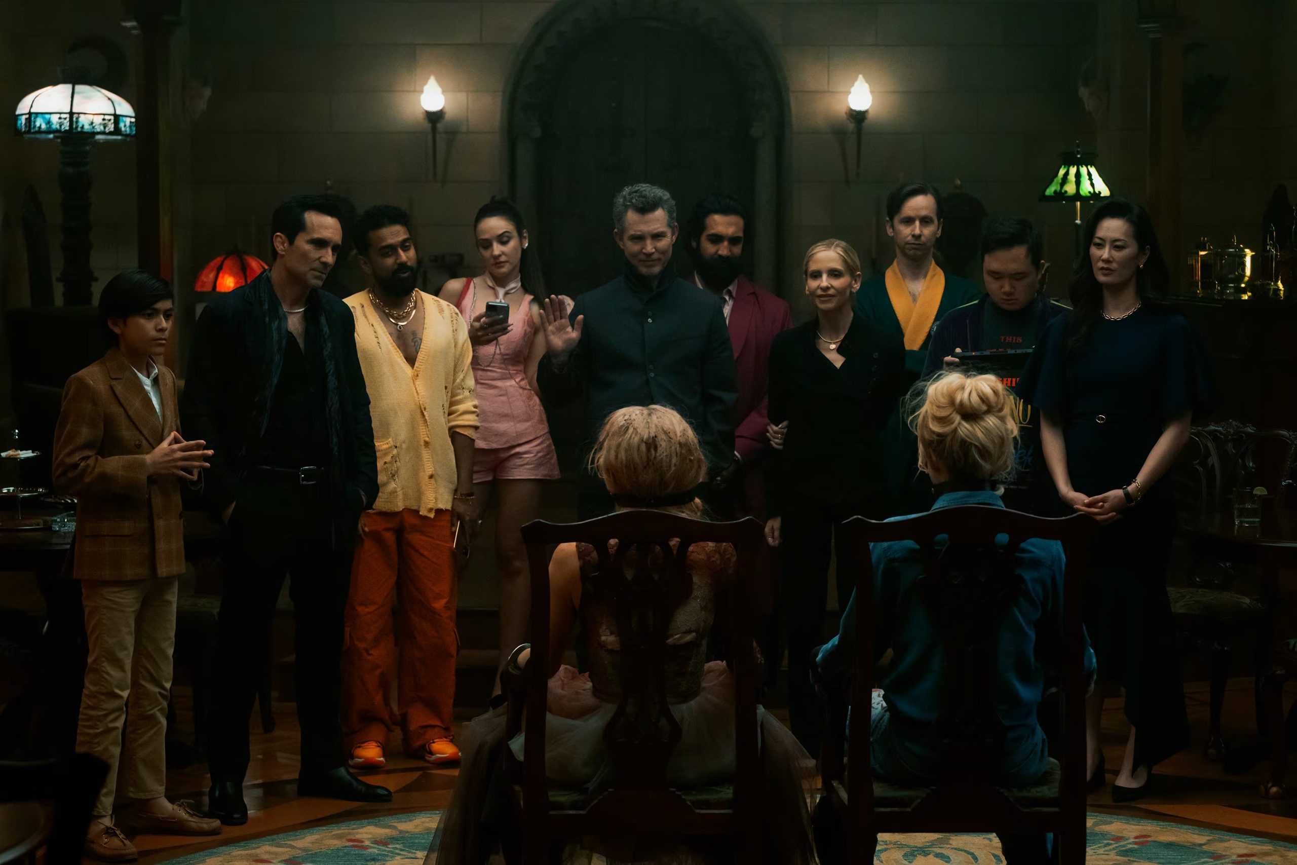 From L to R: Juan Pablo Romero, Nestor Carbonell, Varun Saranga, Maša Lizdek, Shawn Hatosy, Samara Weaving, Nadeem Umar-Khitab, Sarah Michelle Gellar, Daniel Beirne, Kathryn Newton, Antony Hall, and Olivia Cheng in READY OR NOT 2: HERE I COME. Photo by Searchlight Pictures/Pief Weyman, Courtesy of Searchlight Pictures. © 2026 Searchlight Pictures. All Rights Reserved.