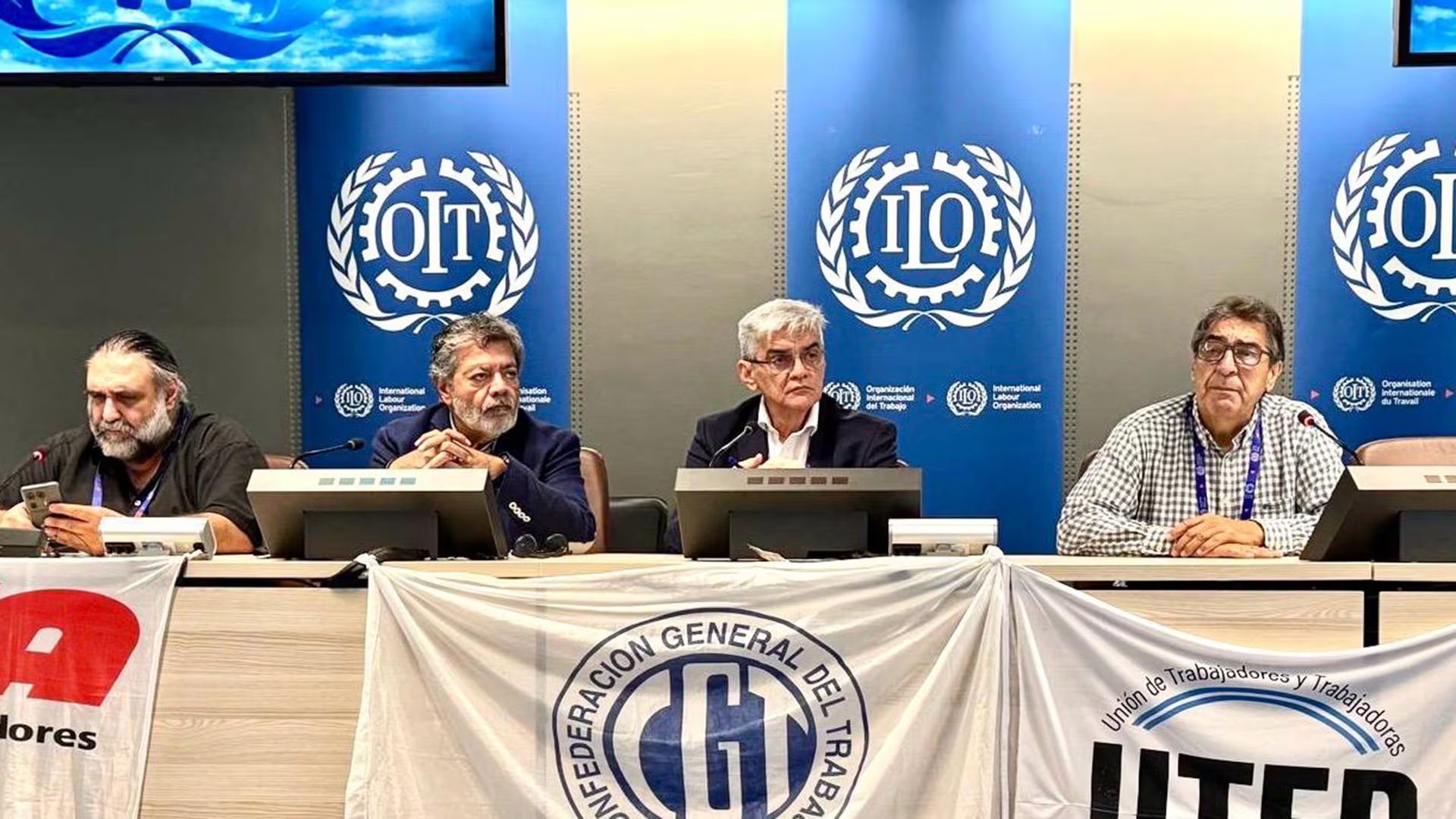 Roberto Baradel, Gerardo Martínez, Rafael Freire y Hugo Godoy, en el acto realizado en la OIT en 2025
