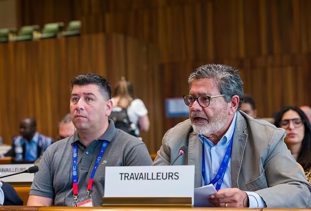 Gerardo Martínez y Cristian Jerónimo, de la CGT, durante una deliberación en la OIT
