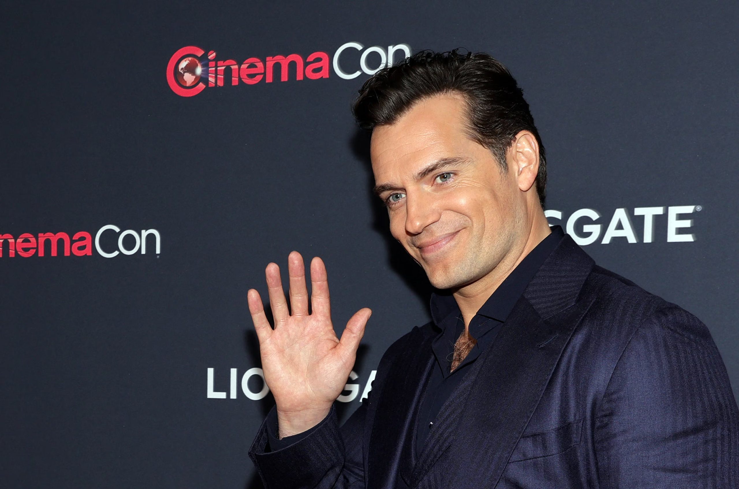 Henry Cavill, promoting the film The Ministry of Ungentlemanly Warfare, waves on the red carpet before a Lionsgate presentation at CinemaCon, the official convention of the National Association of Theatre Owners, in Las Vegas, Nevada, U.S. April 10, 2024. REUTERS/Steve Marcus