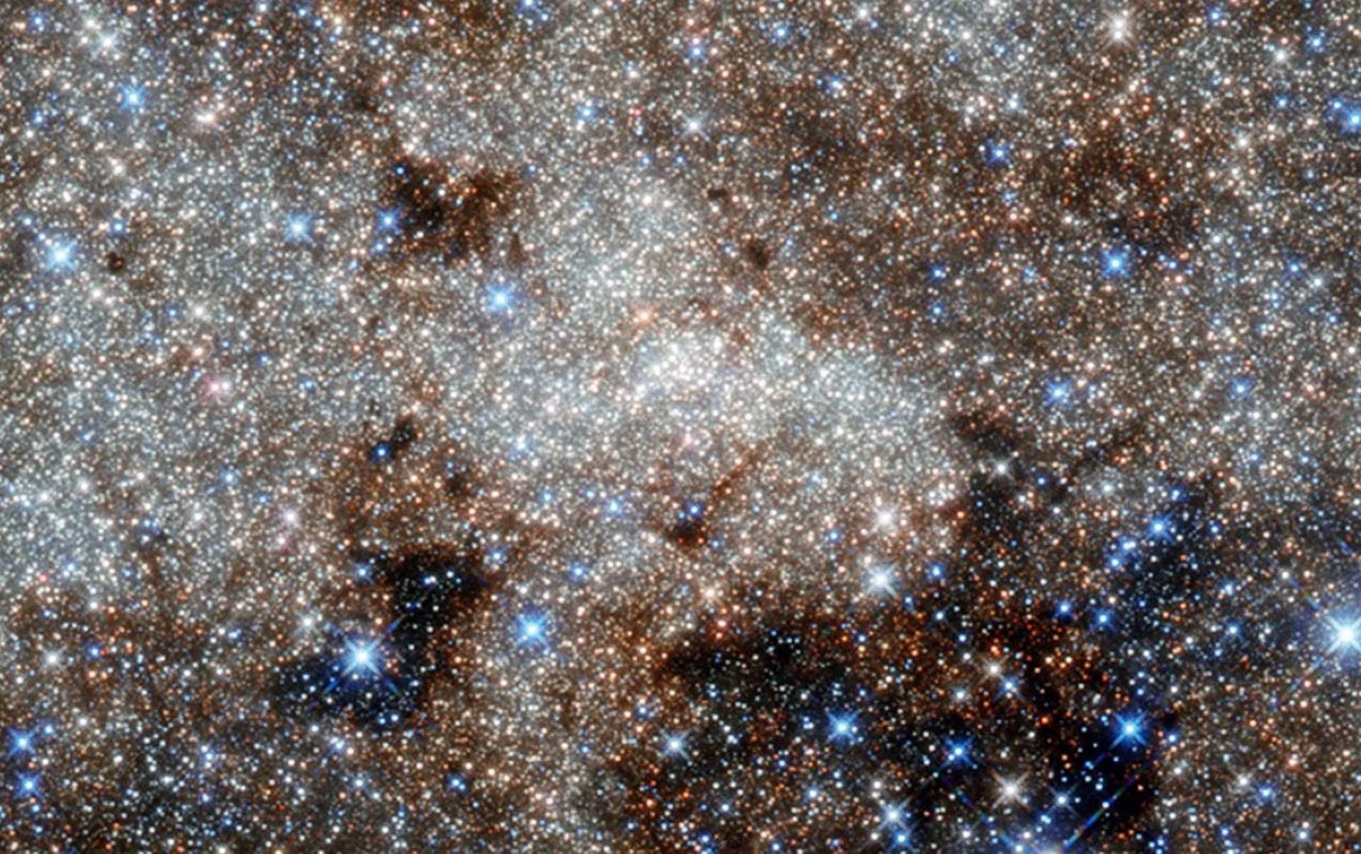 El centro de la Vía Láctea mirando hacia la constelación de Sagitario y el agujero negro invisible llamado Sagitario A estrella. (Observatorio HAWC / High-Altitude Water Cherenkov)
