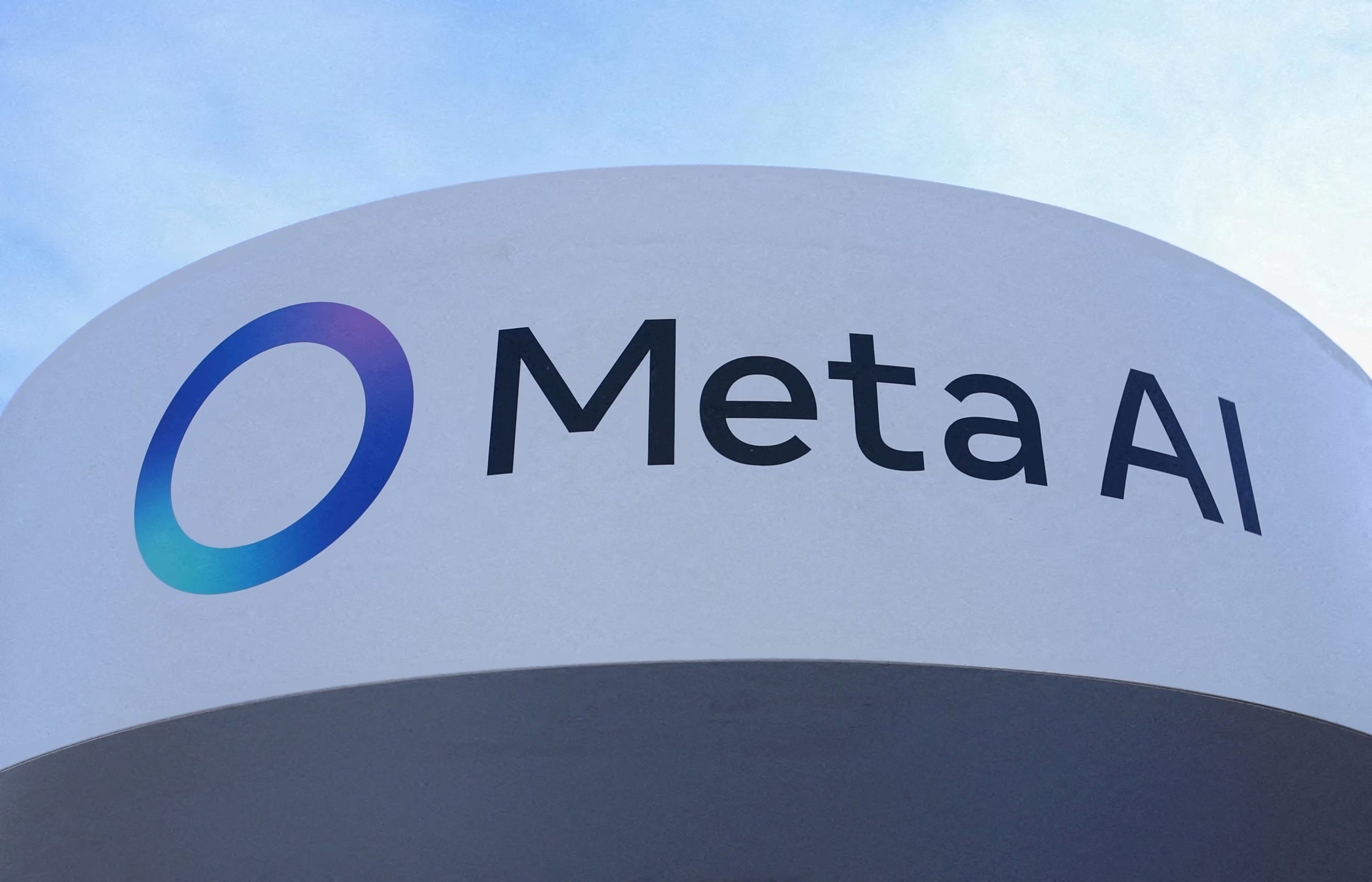 FILE PHOTO: A logo of Meta AI sits outside the Meta House on the opening day of the 55th annual meeting of the World Economic Forum in Davos, Switzerland, January 20, 2025. REUTERS/Yves Herman//File Photo