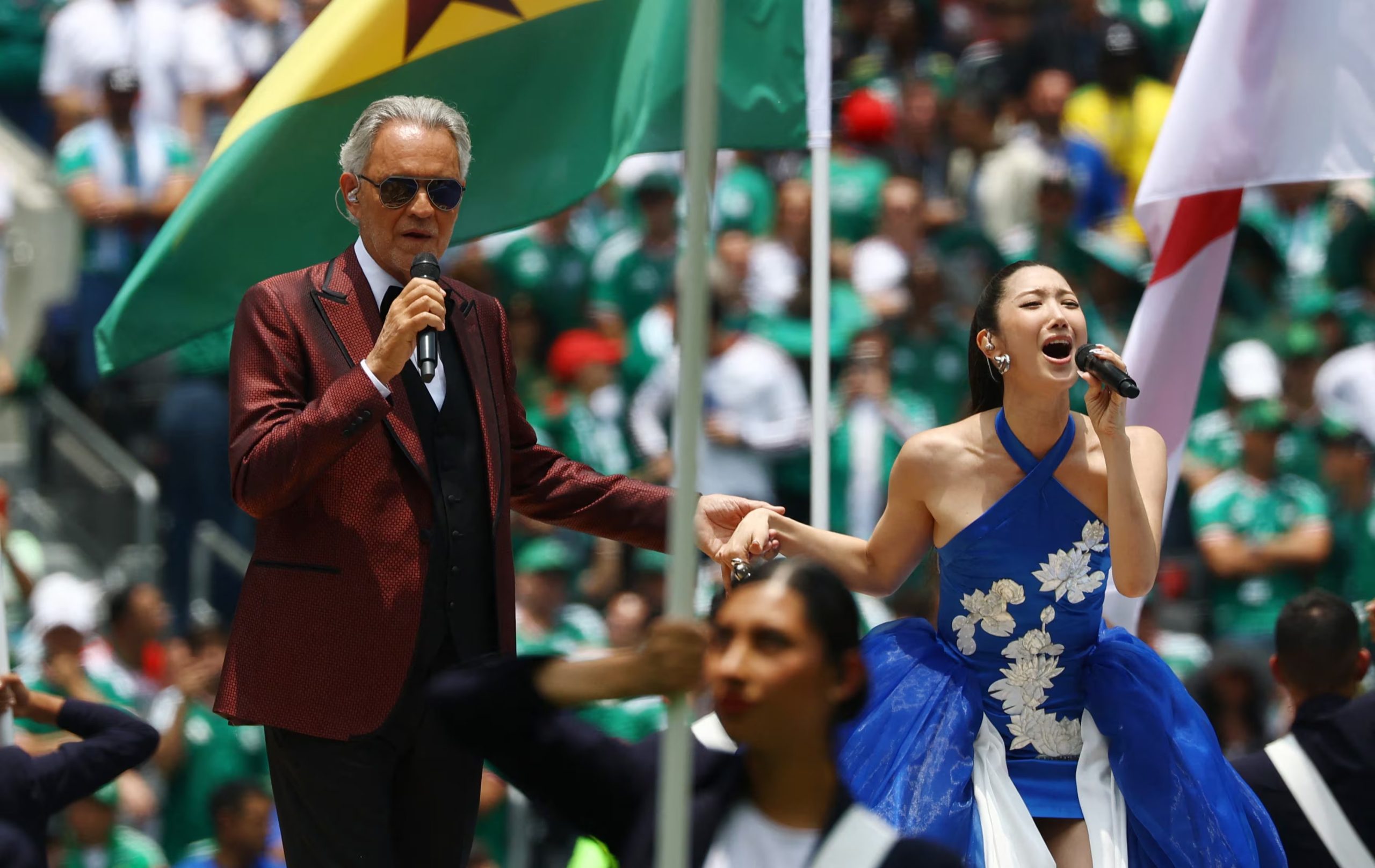 Soccer Football - FIFA World Cup 2026 - Group A - Mexico v South Africa - Estadio Azteca, Mexico City, Mexico - June 11, 2026 Singers Andrea Bocelli and Ejae performs before the match REUTERS/Pawel Kopczynski
