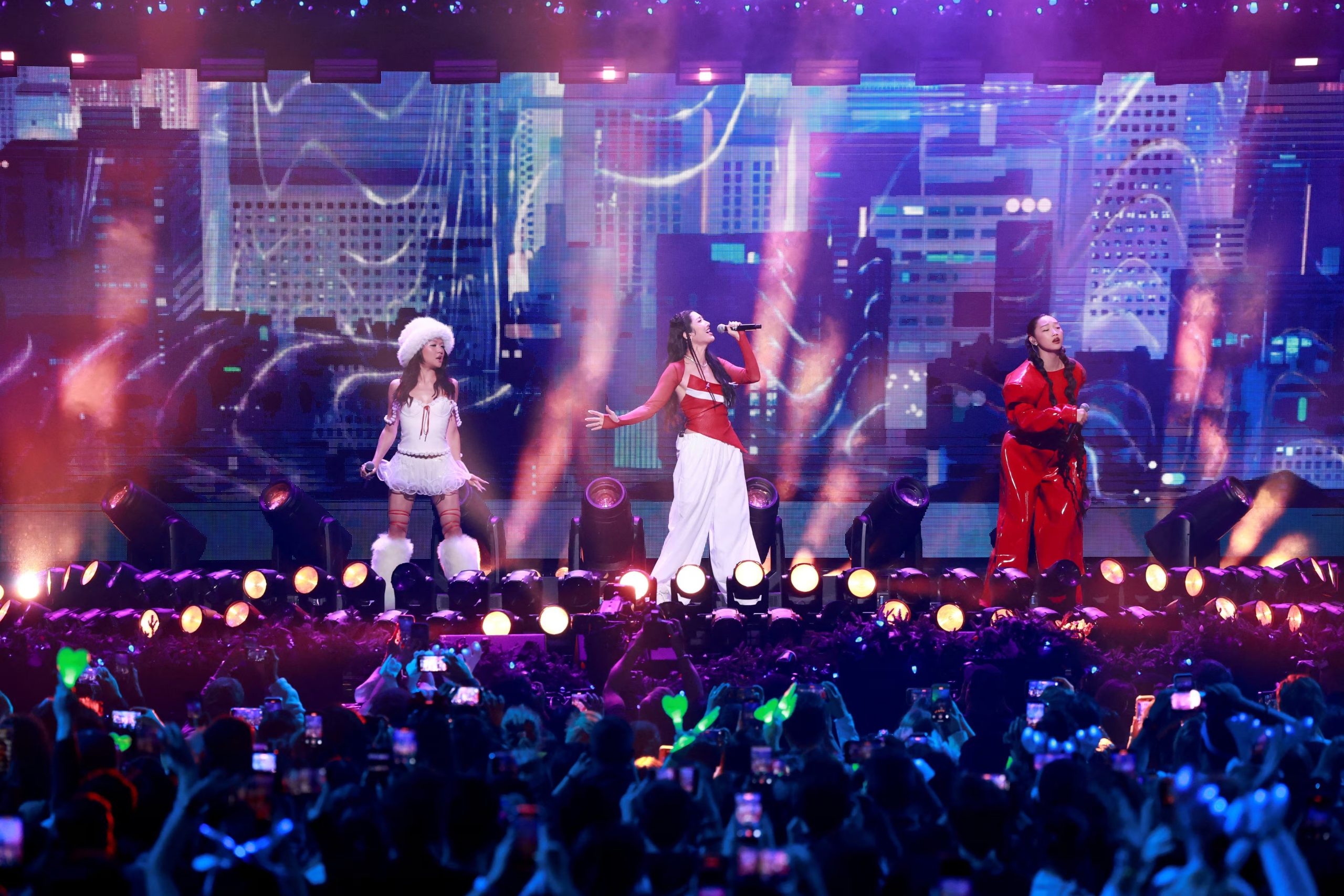 'KPop Demon Hunters' singers EJAE, Audrey Nuna, and Rei Ami perform during the iHeartRadio Jingle Ball concert in Inglewood, California, U.S., December 5, 2025. REUTERS/Mario Anzuoni