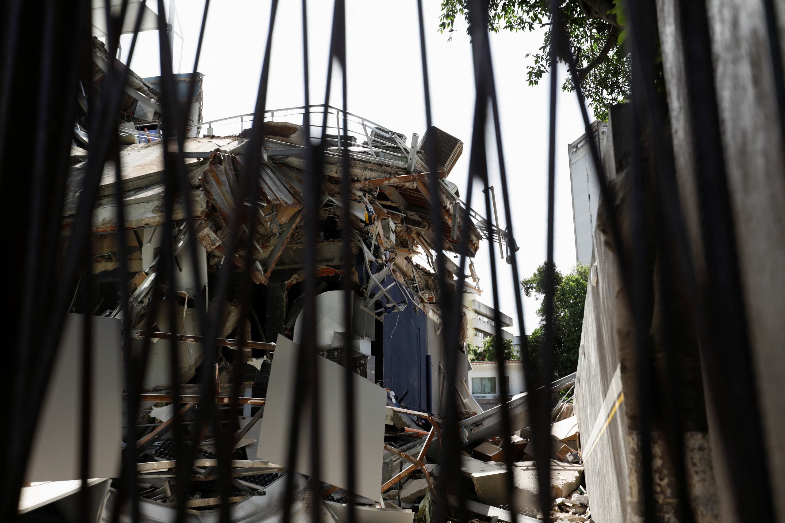 A view of the remains of a building damaged by earthquakes that hit the country, in Caracas, Venezuela, June 25, 2026. REUTERS/Fausto Torrealba
