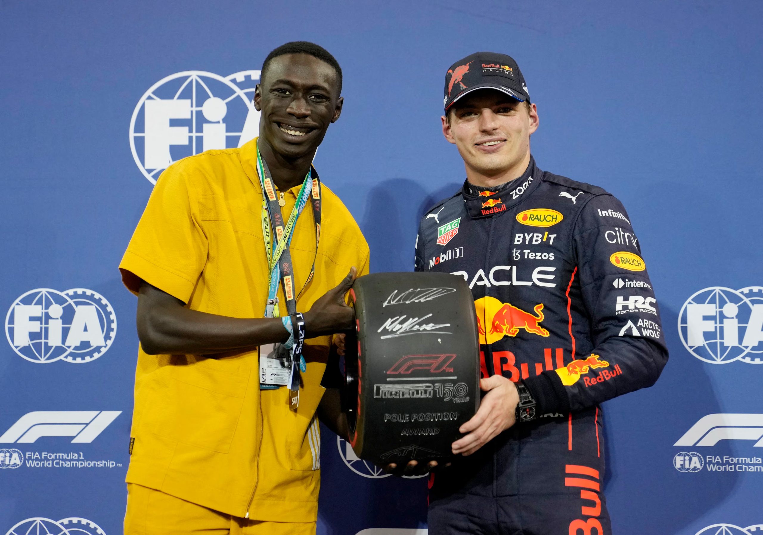 Formula One F1 - Abu Dhabi Grand Prix - Yas Marina Circuit, Abu Dhabi, United Arab Emirates - November 19, 2022 Red Bull's Max Verstappen celebrates after qualifying in pole position with Social media personality Khaby Lame Pool via REUTERS/Kamran Jebreili