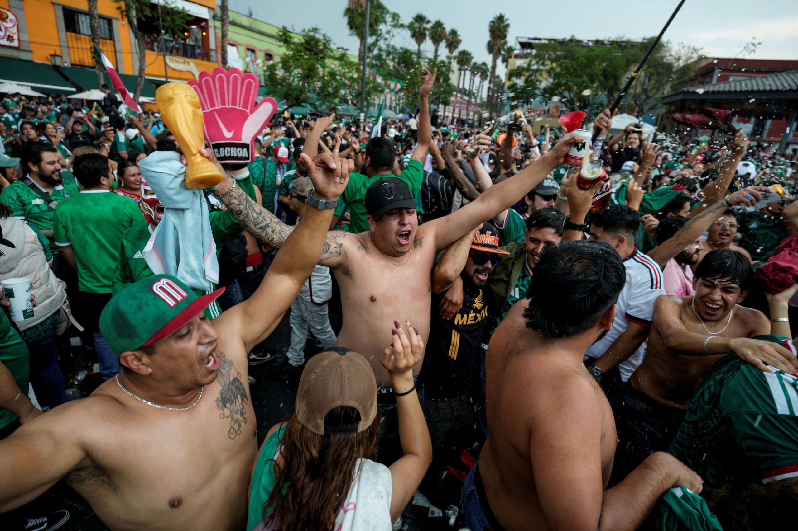 Fans celebrate Mexico's victory over South Africa during the 2026 FIFA World Cup in Plaza Garibaldi in Mexico City, Mexico, June 11, 2026. REUTERS/Armando Vega