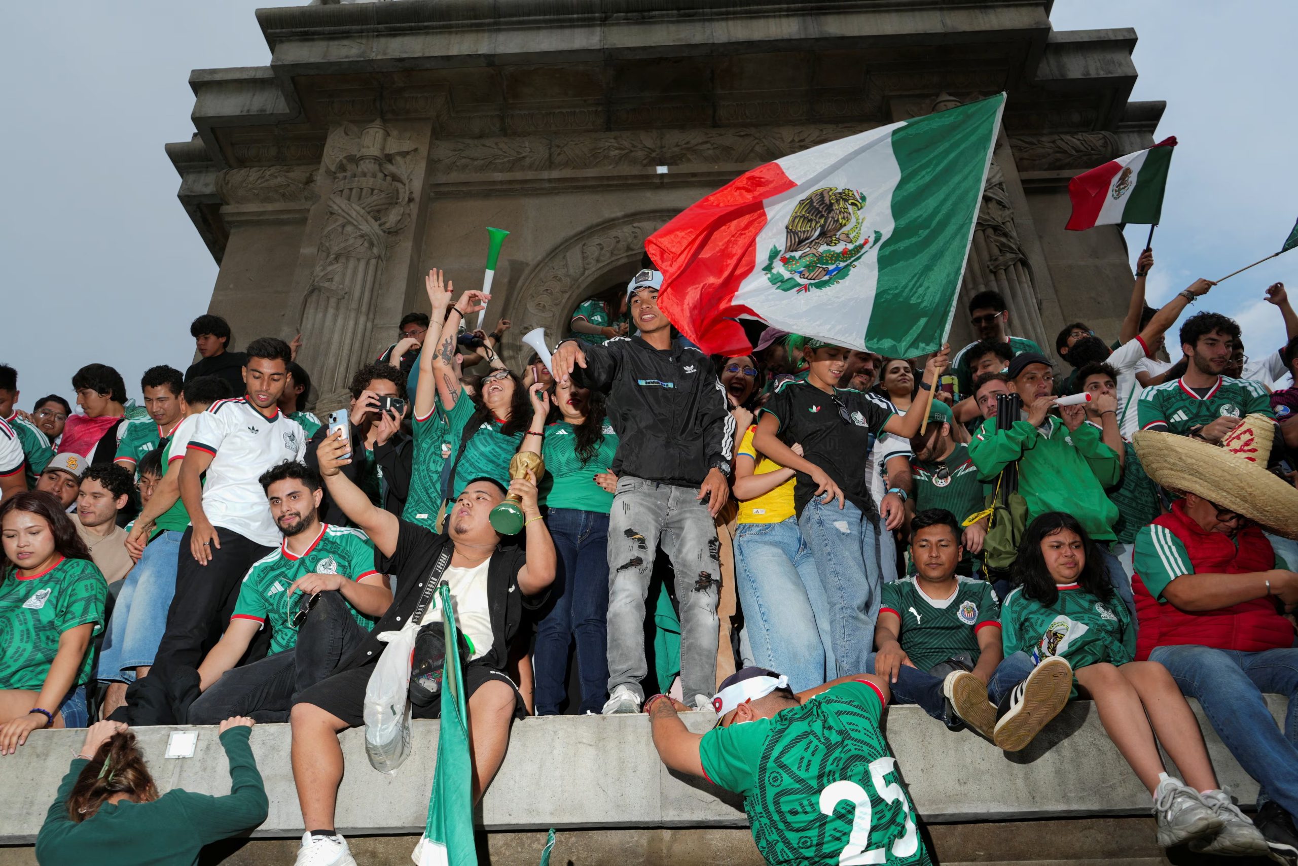 People celebrate Mexico's victory in the opening match of the 2026 FIFA World Cup, in Mexico City, Mexico, June 11, 2026. REUTERS/Fred Ramos