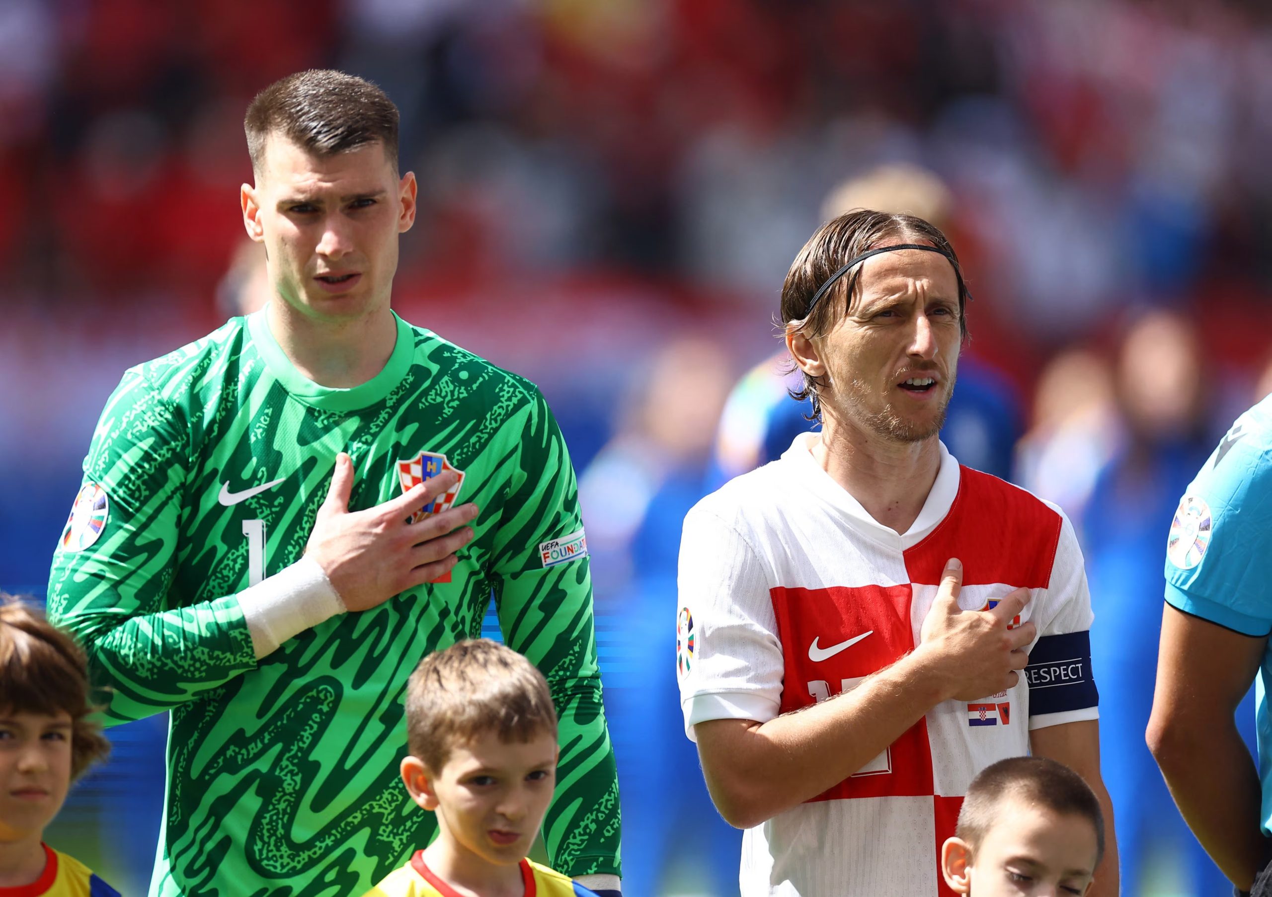 Modric y Livakovic. (REUTERS/Lisi Niesner)