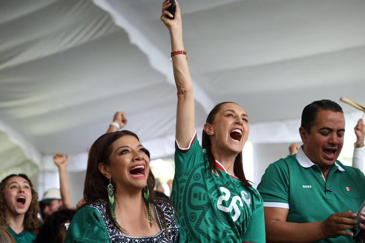 Mexico's President Sheinbaum celebrates a goal at Fan Fest during the 2026 World Cup opener in Mexico City, Mexico, June 11, 2026. Presidencia de Mexico/Handout via REUTERS ATTENTION EDITORS - THIS IMAGE HAS BEEN SUPPLIED BY A THIRD PARTY. NO RESALES. NO ARCHIVES.