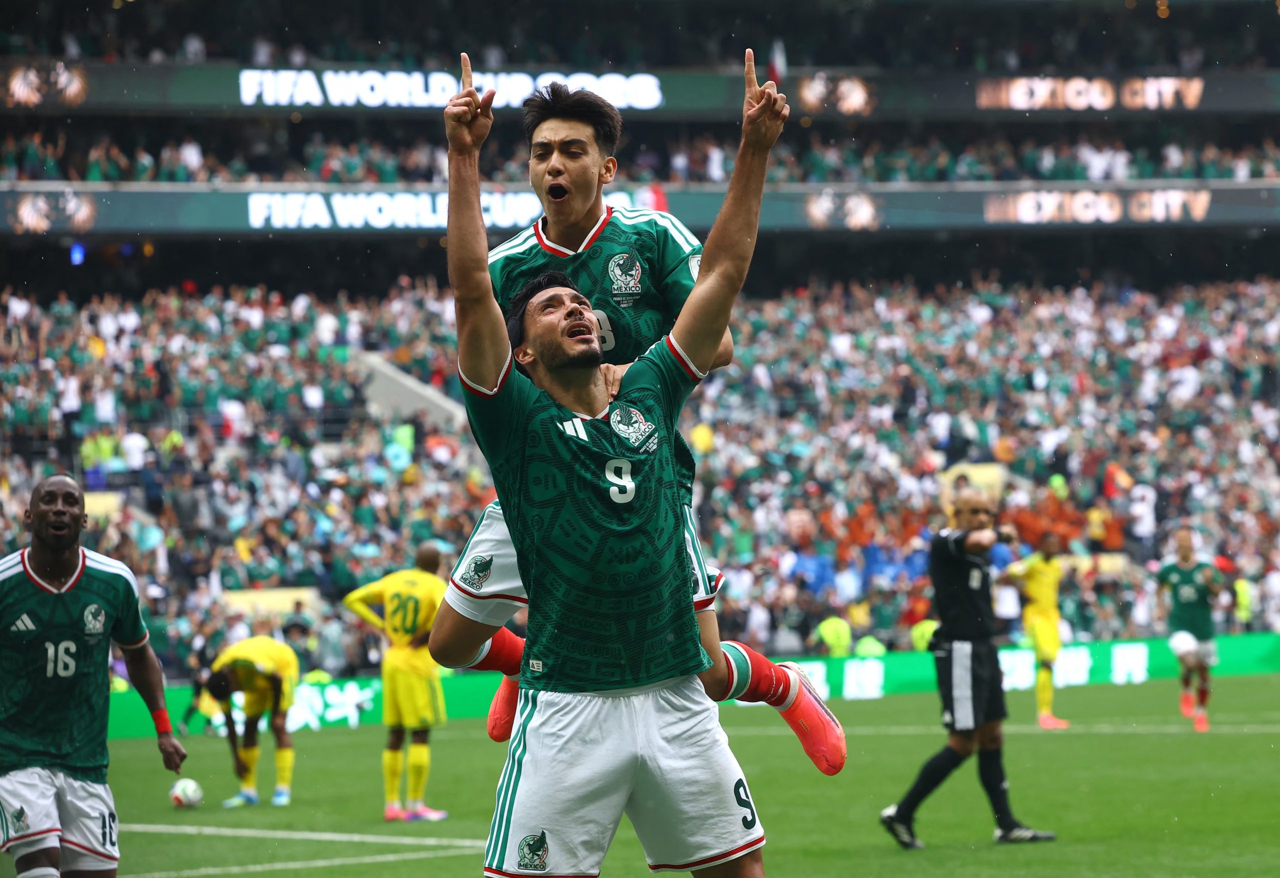 Soccer Football - FIFA World Cup 2026 - Group A - Mexico v South Africa - Estadio Azteca, Mexico City, Mexico - June 11, 2026 Mexico's Raul Jimenez celebrates scoring their second goal REUTERS/Pawel Kopczynski