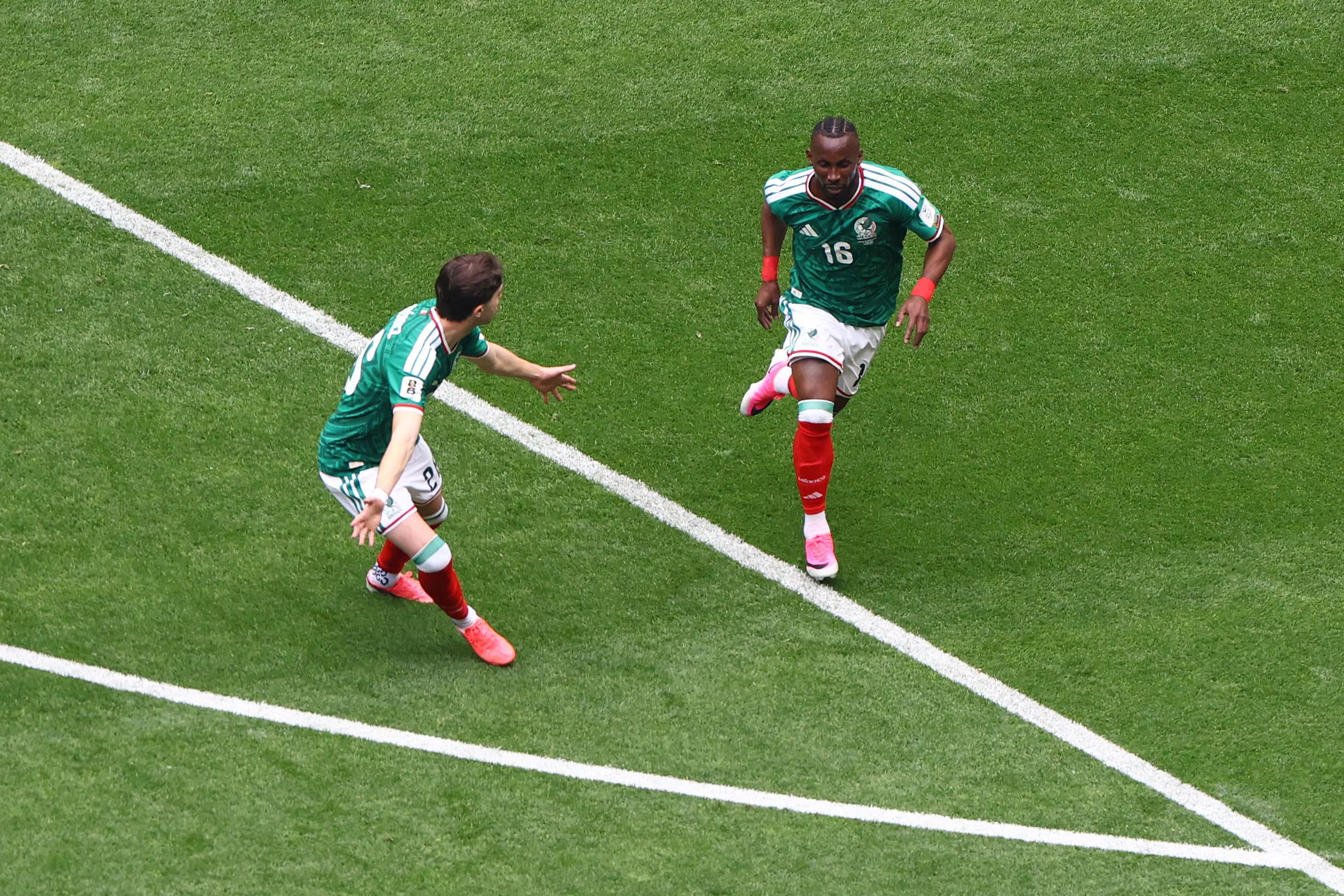 Soccer Football - FIFA World Cup 2026 - Group A - Mexico v South Africa - Estadio Azteca, Mexico City, Mexico - June 11, 2026 Mexico's Julian Quinones celebrates scoring their first goal with Brian Gutierrez REUTERS/Raquel Cunha