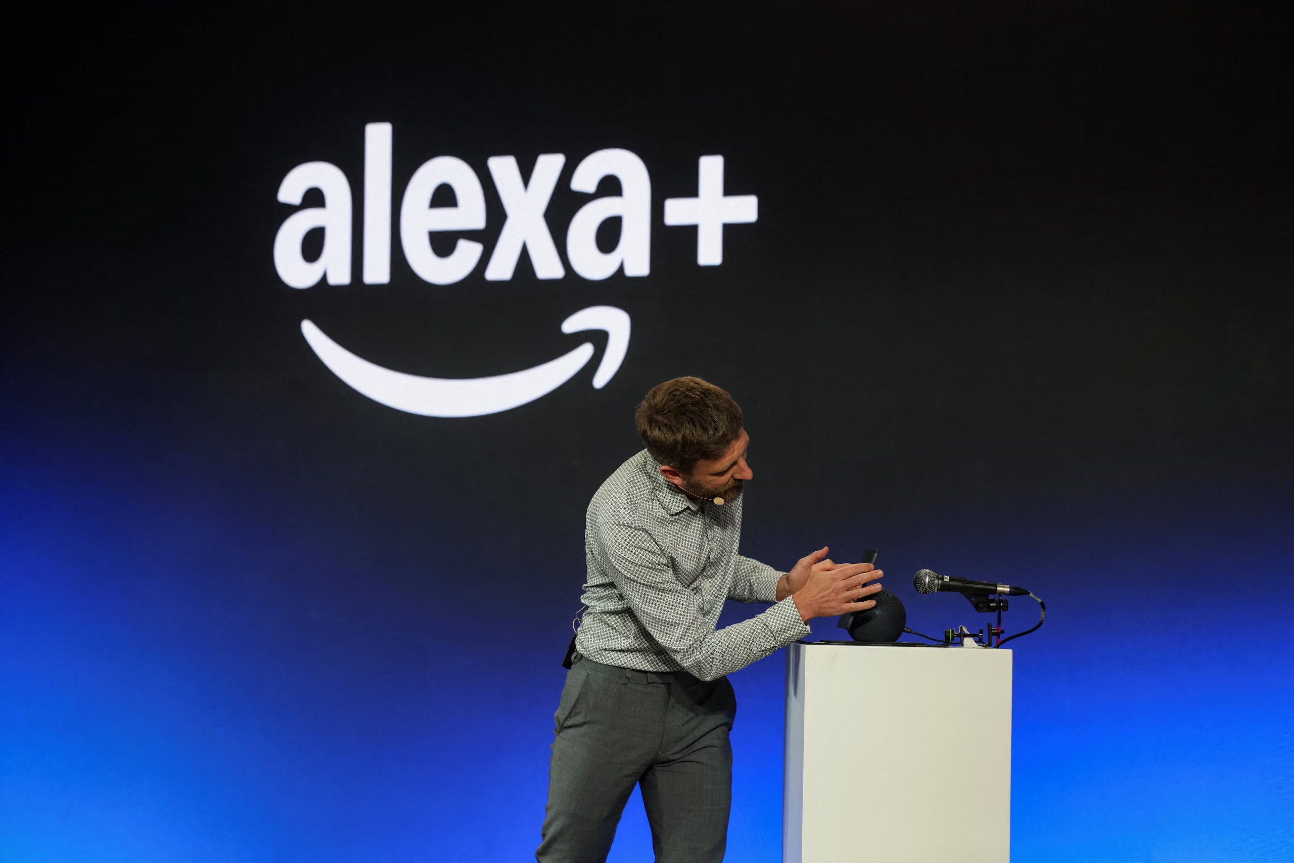 Trevor Wood, Senior Manager of Applied Science at Amazon, speaks as an Alexa+ demonstration goes wrong during the Delivering the Future EMEA 2026 event at Amazon's LCY3 fulfilment centre in Dartford, Britain, June 4, 2026. REUTERS/Toby Shepheard