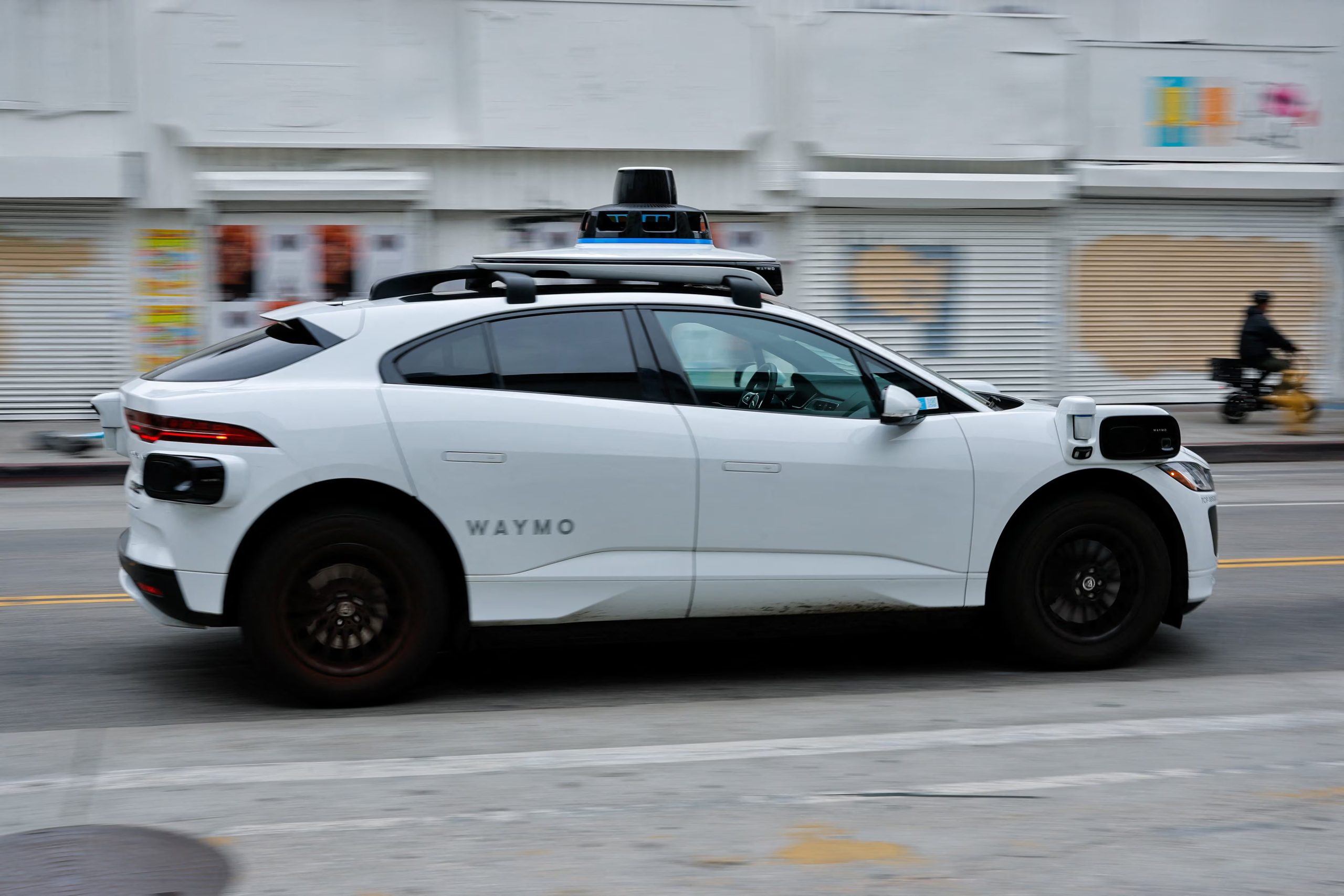 A Waymo driverless car driving in downtown Los Angeles, California, U.S. May 1, 2026. REUTERS/Mike Blake