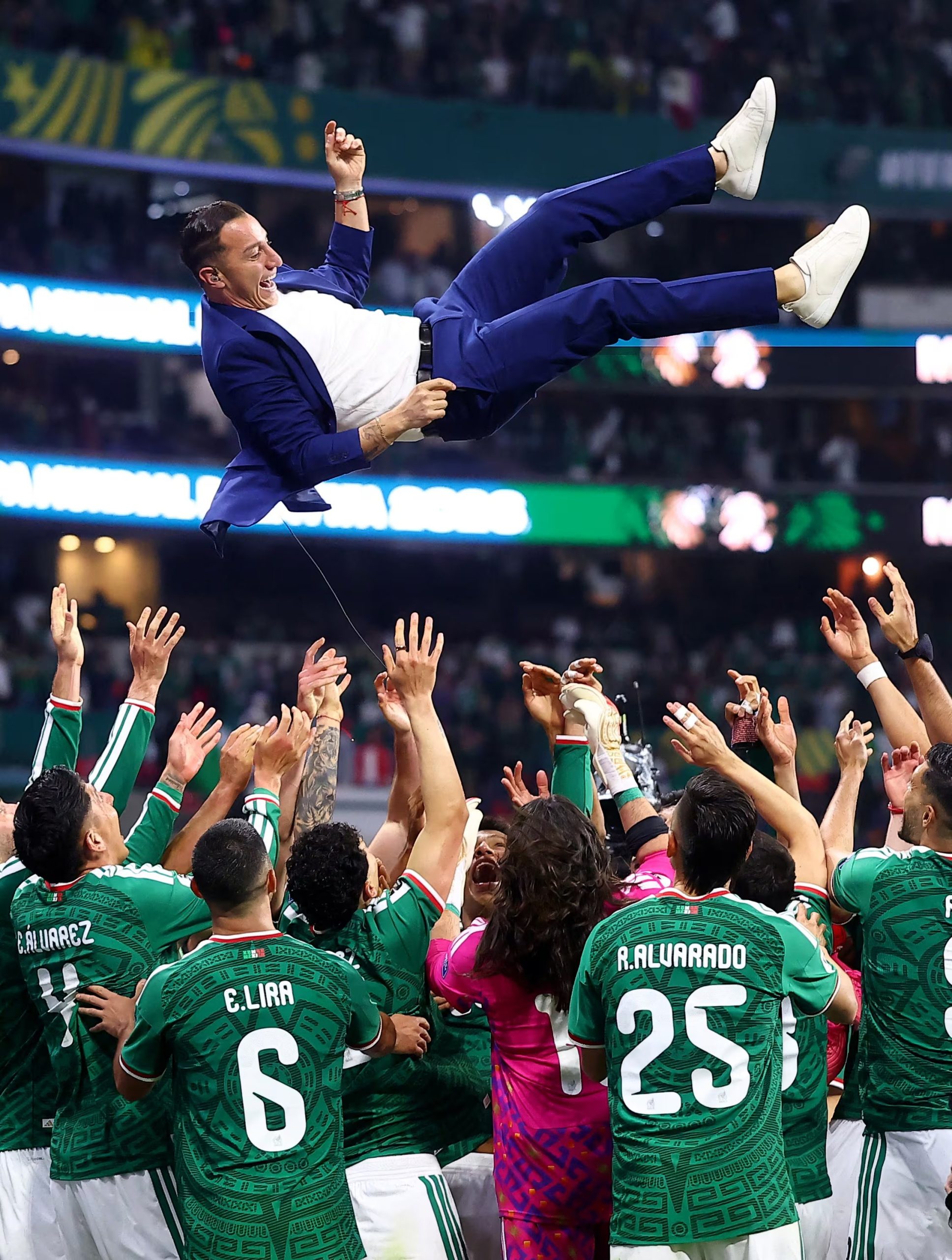Soccer Football - FIFA World Cup 2026 - Round of 32 - Mexico v Ecuador - Estadio Azteca, Mexico City, Mexico - June 30, 2026 Former Mexico player Andres Guardado is thrown in the air in celebration by the players after the match as Mexico qualify for the round of 16 stage of the World Cup REUTERS/Eloisa Sanchez