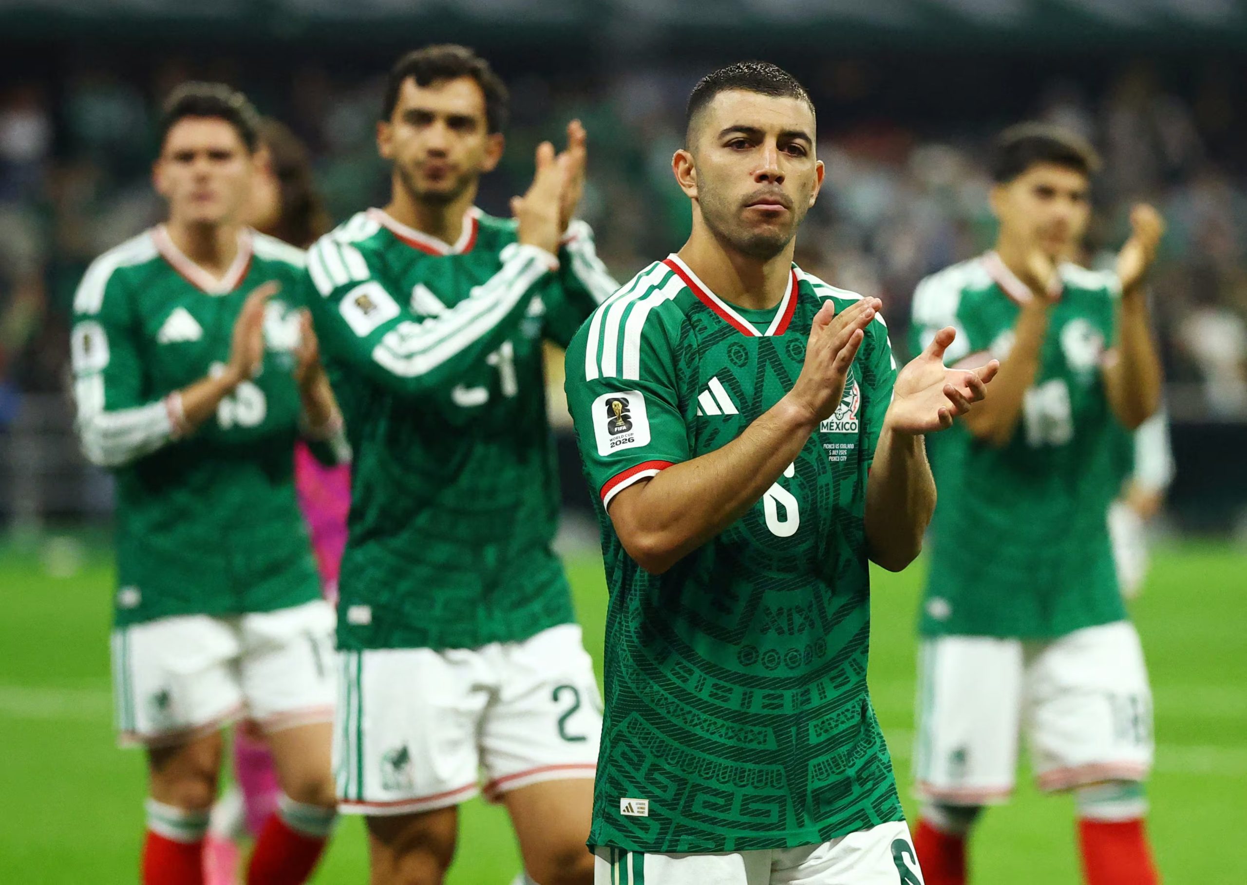 Soccer Football - FIFA World Cup 2026 - Round of 16 - Mexico v England - Estadio Azteca, Mexico City, Mexico - July 5, 2026 Mexico's Erik Lira and teammates applaud fans after the match as Mexico are eliminated from the World Cup REUTERS/Daniel Becerril