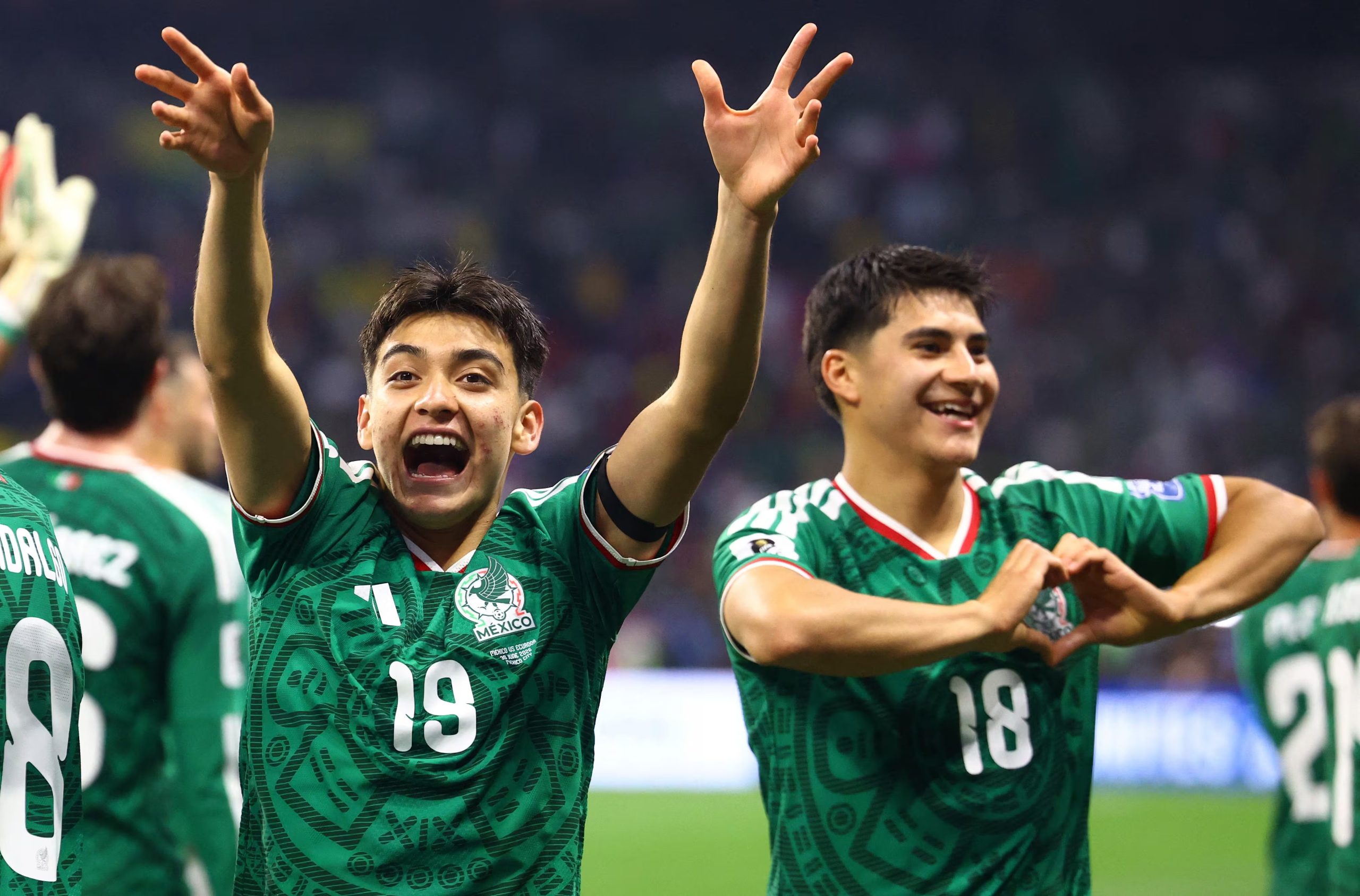Soccer Football - FIFA World Cup 2026 - Round of 32 - Mexico v Ecuador - Estadio Azteca, Mexico City, Mexico - June 30, 2026 Mexico's Gilberto Mora and Obed Vargas celebrate after the match REUTERS/Raquel Cunha
