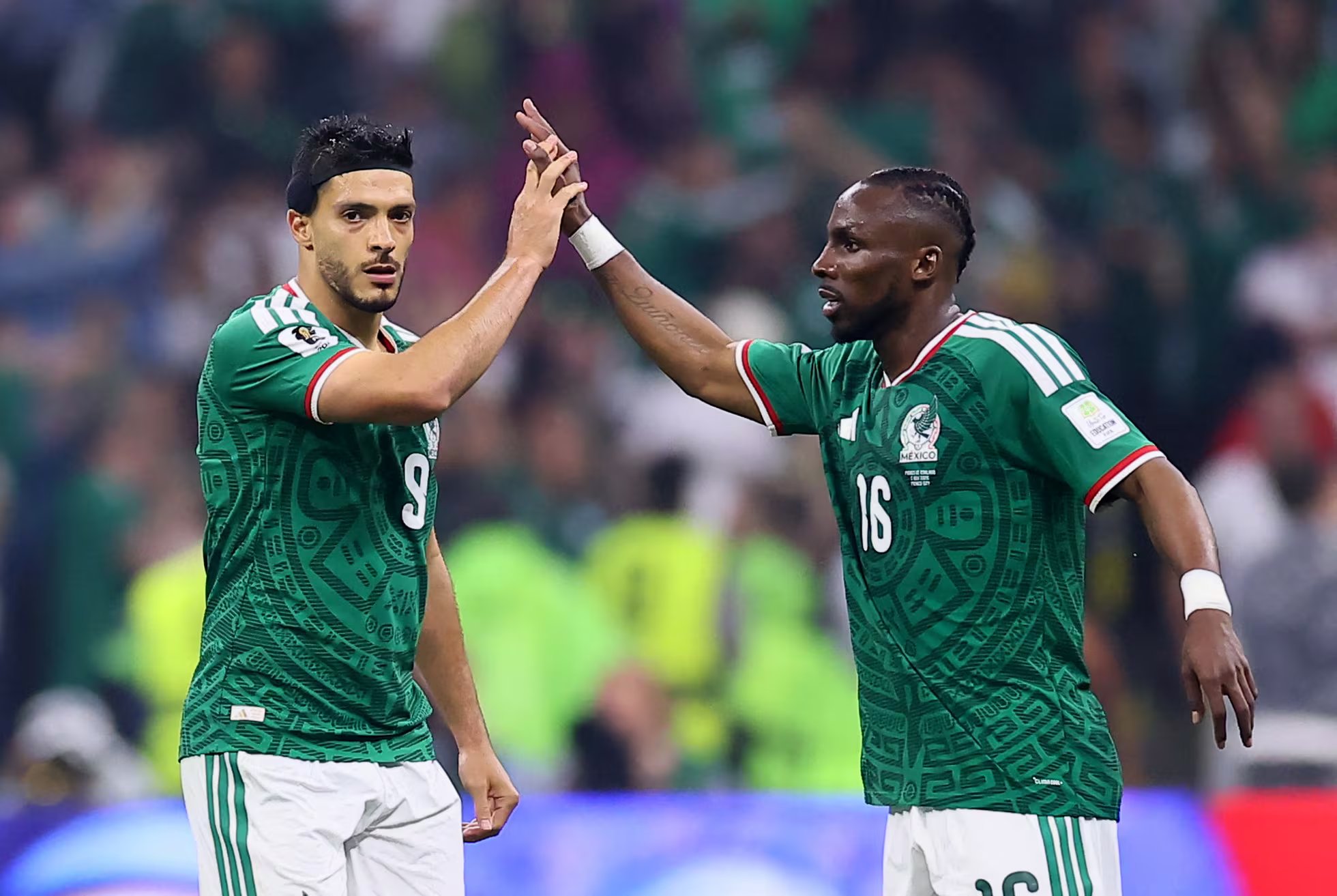 Soccer Football - FIFA World Cup 2026 - Round of 16 - Mexico v England - Estadio Azteca, Mexico City, Mexico - July 5, 2026 Mexico's Raul Jimenez celebrates scoring their second goal with Julian Quinones REUTERS/Eloisa Sanchez