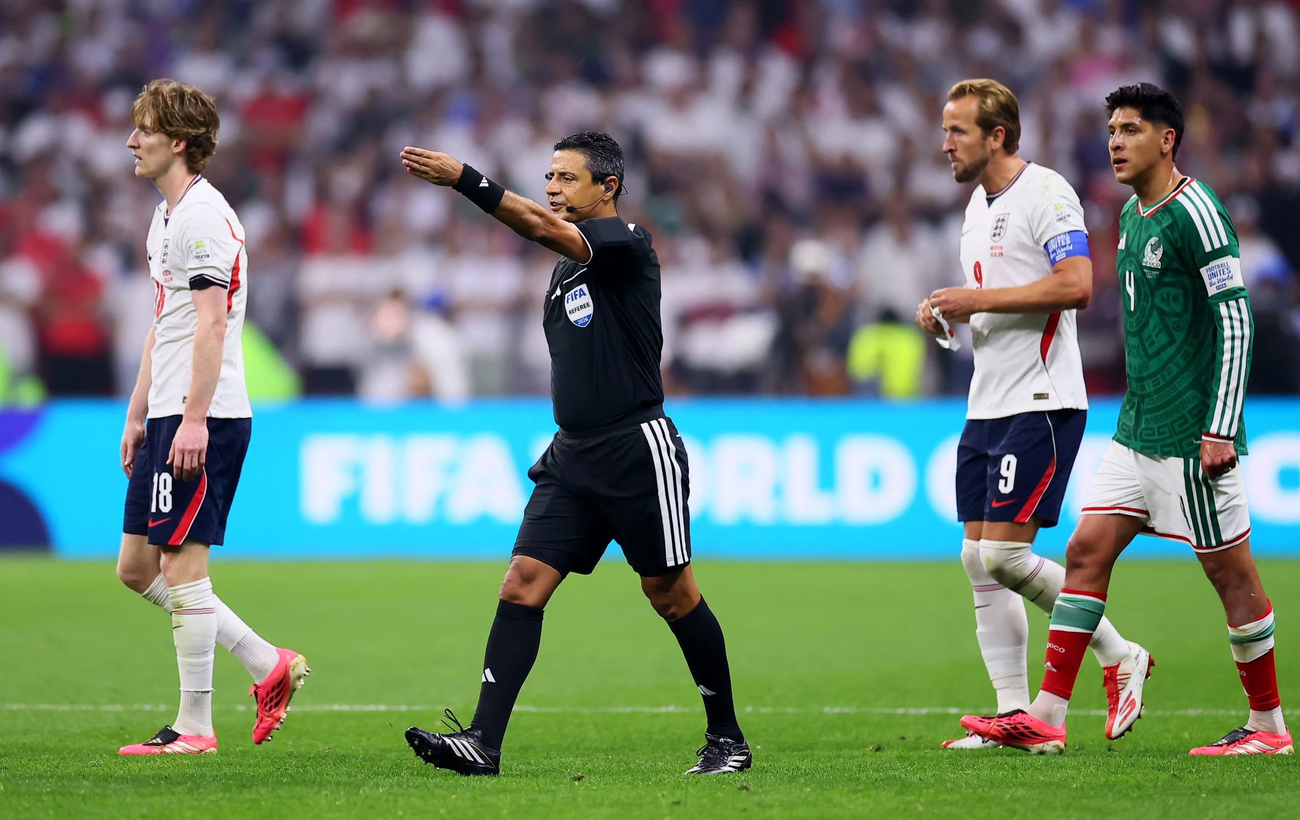 Soccer Football - FIFA World Cup 2026 - Round of 16 - Mexico v England - Estadio Azteca, Mexico City, Mexico - July 5, 2026 Referee Alireza Faghani awards a penalty to Mexico after a VAR review REUTERS/Eloisa Sanchez