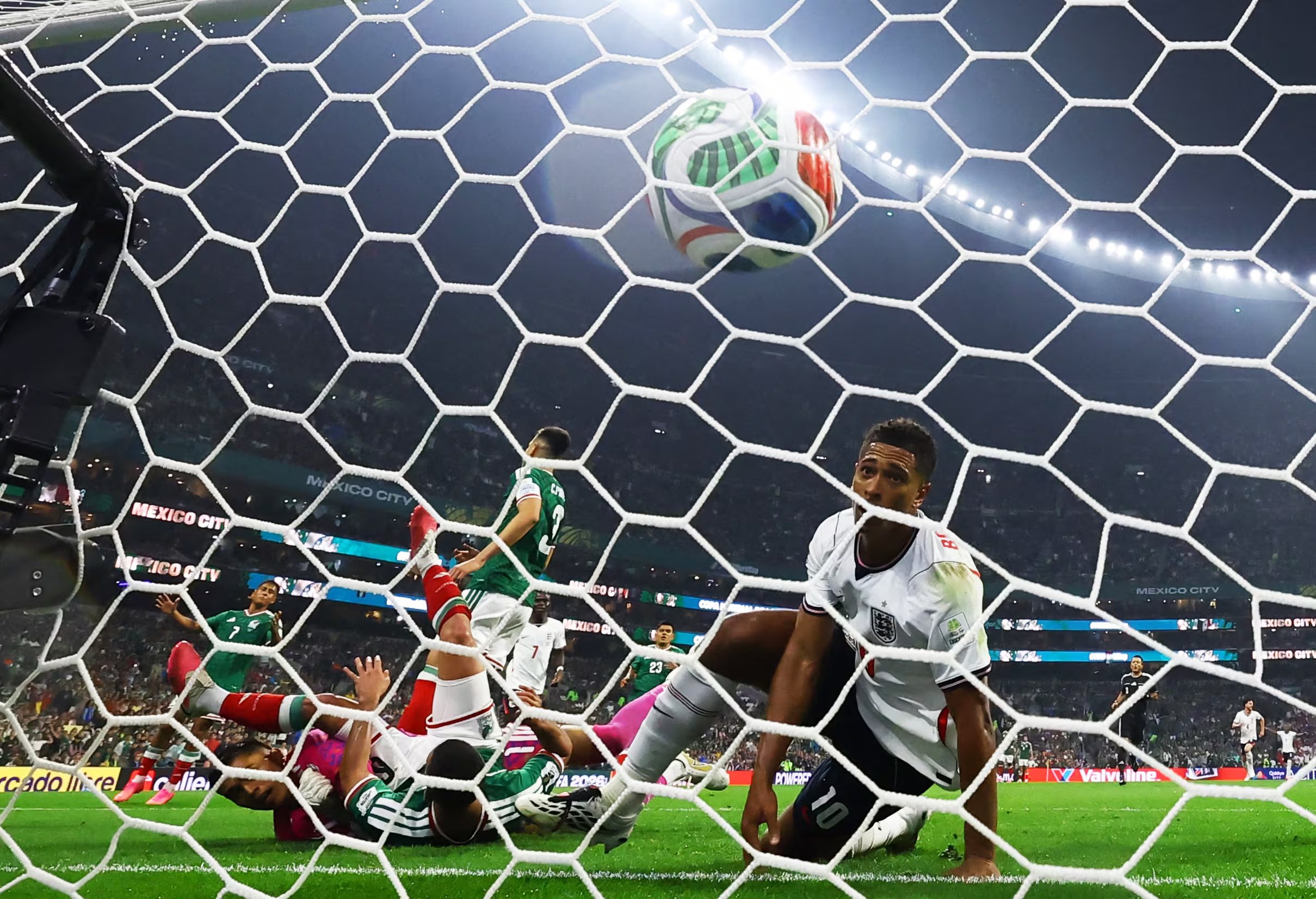 Soccer Football - FIFA World Cup 2026 - Round of 16 - Mexico v England - Estadio Azteca, Mexico City, Mexico - July 5, 2026 England's Jude Bellingham scores their second goal REUTERS/Eloisa Sanchez