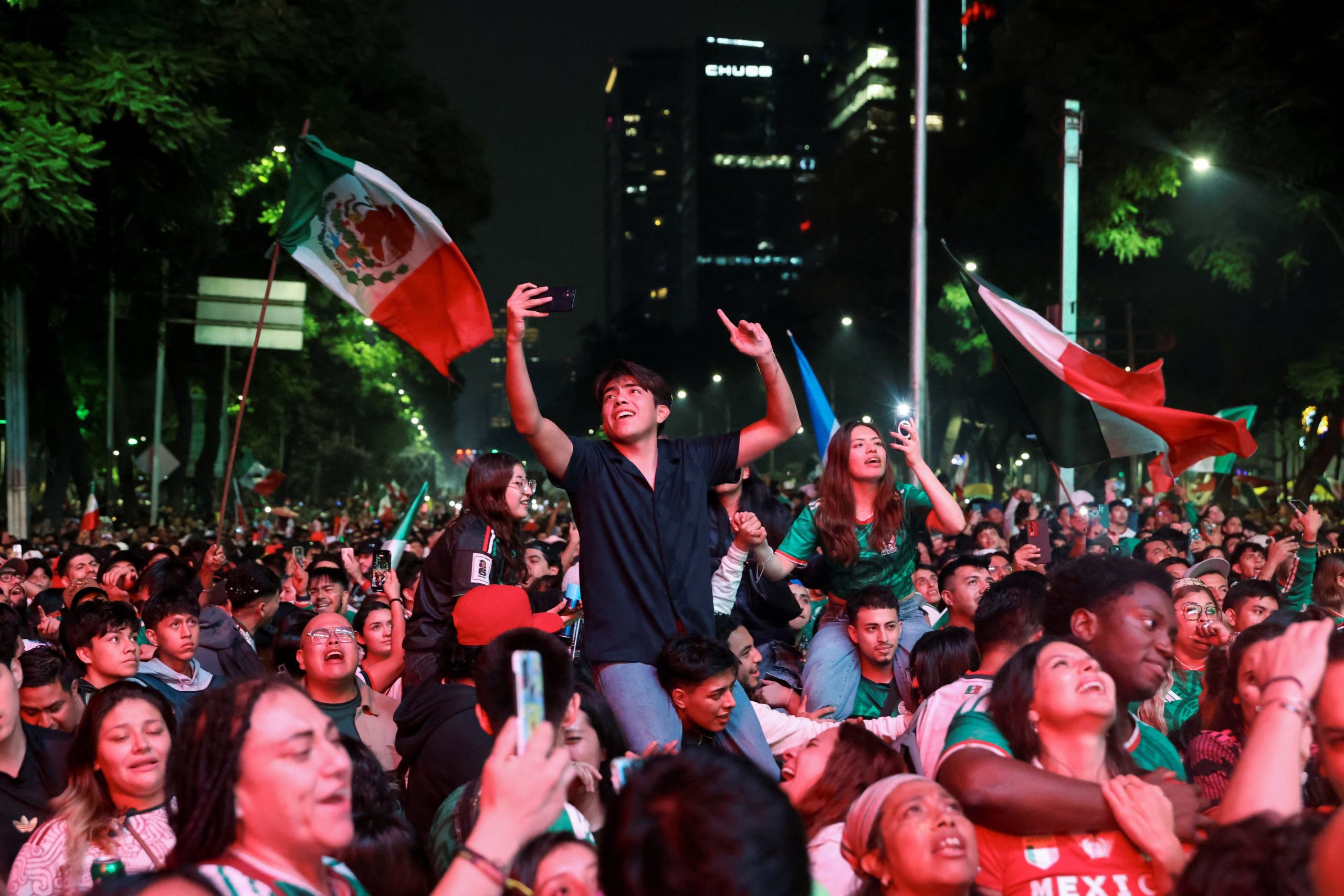 Soccer Football - FIFA World Cup 2026 - Round of 32 - Mexico v Ecuador - Mexico City, Mexico - June 30, 2026 Fans celebrate after Mexico won the game REUTERS/Luis Cortes