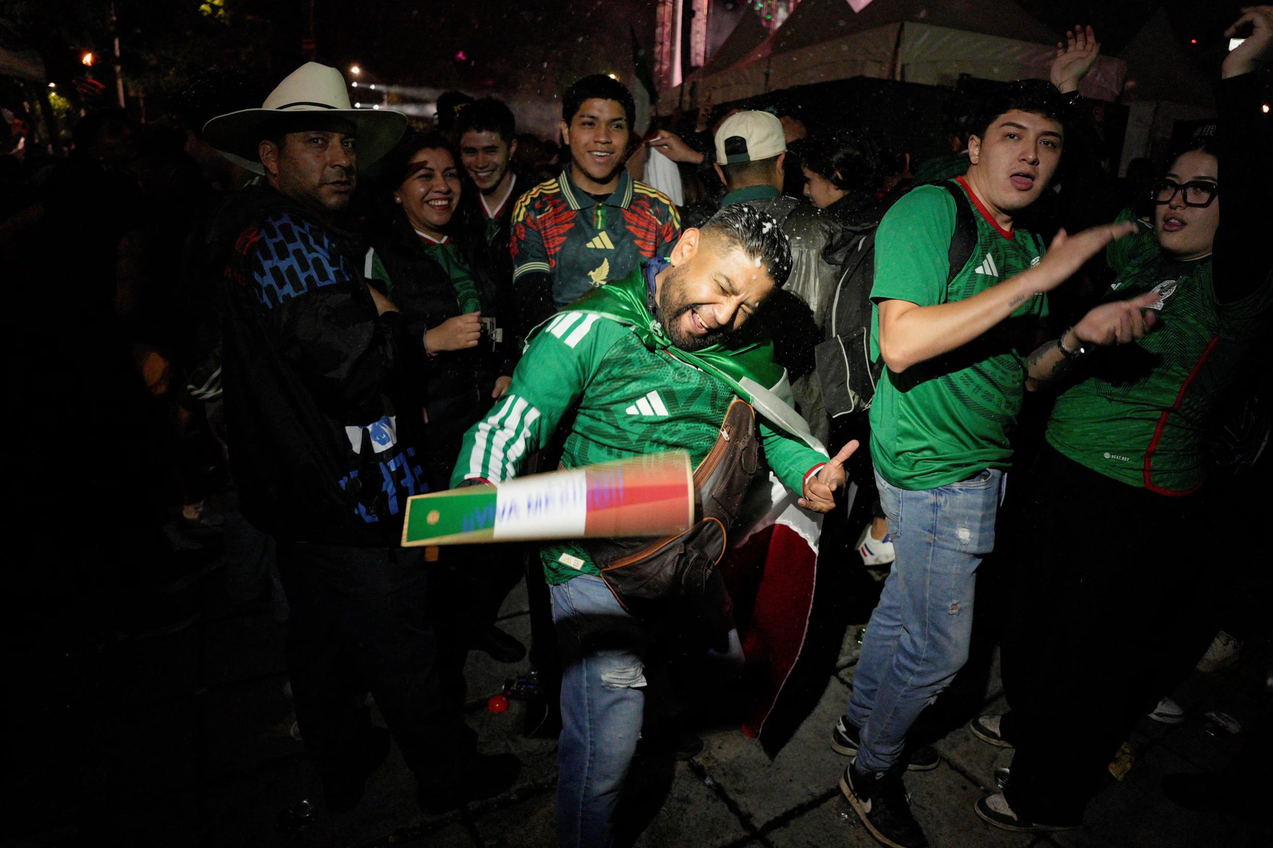 Soccer Football - FIFA World Cup 2026 - Round of 32 - Mexico v Ecuador - Mexico City, Mexico - June 30, 2026 Supporters of Mexico celebrate after Mexico won their game REUTERS/Armando Vega