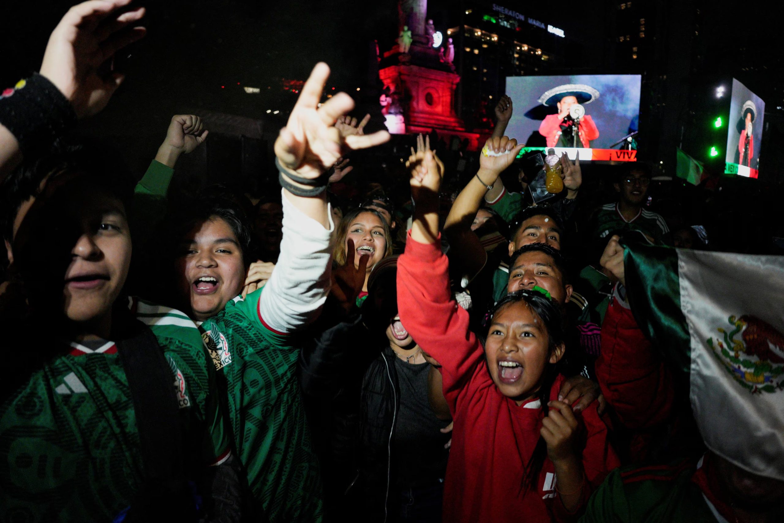 Soccer Football - FIFA World Cup 2026 - Round of 32 - Mexico v Ecuador - Mexico City, Mexico - June 30, 2026 Supporters of Mexico celebrate after Mexico won their game REUTERS/Armando Vega