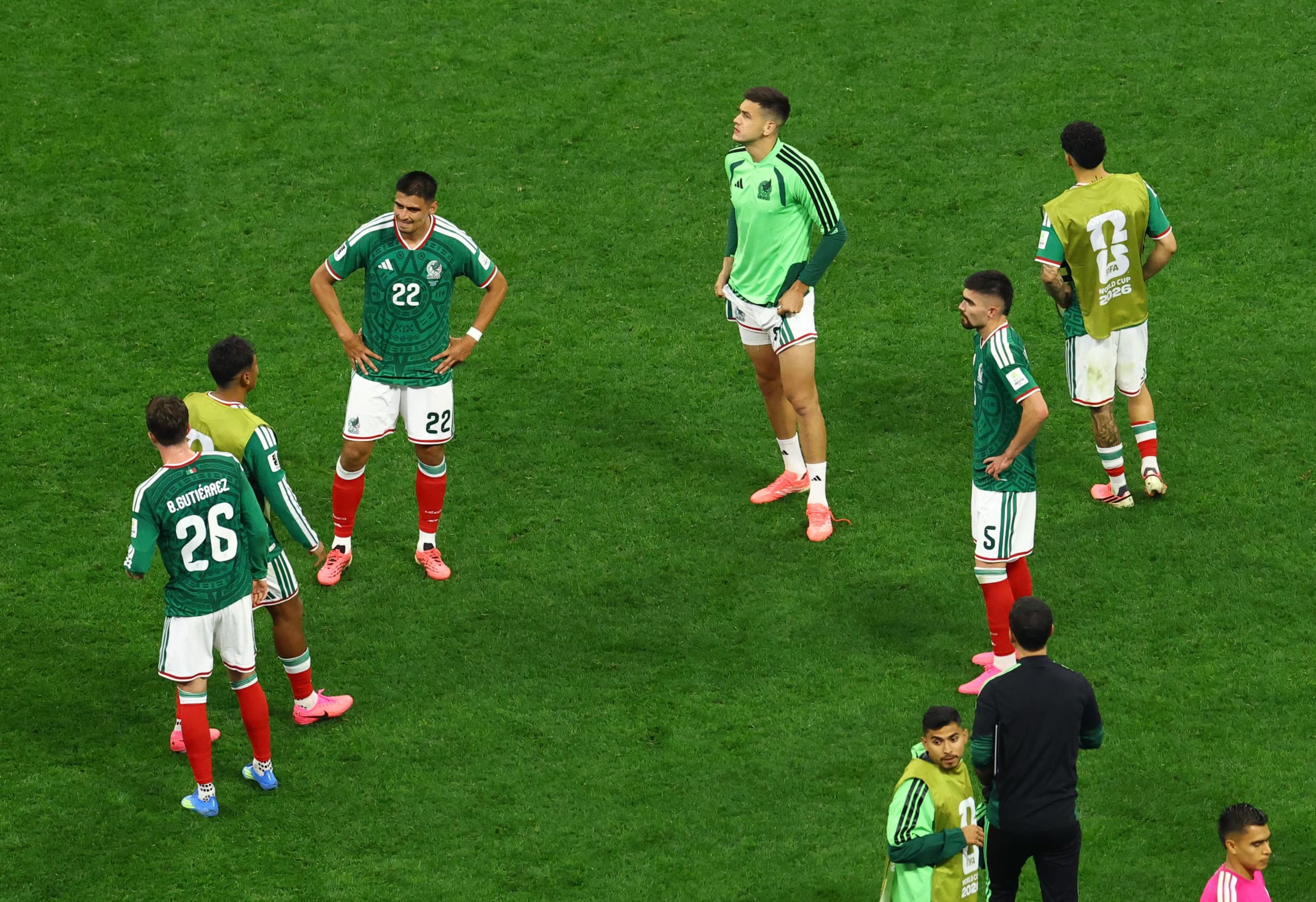 Soccer Football - FIFA World Cup 2026 - Round of 16 - Mexico v England - Estadio Azteca, Mexico City, Mexico - July 5, 2026 Mexico's Guillermo Martinez and teammates look dejected after the match as Mexico are eliminated from the World Cup REUTERS/Henry Romero