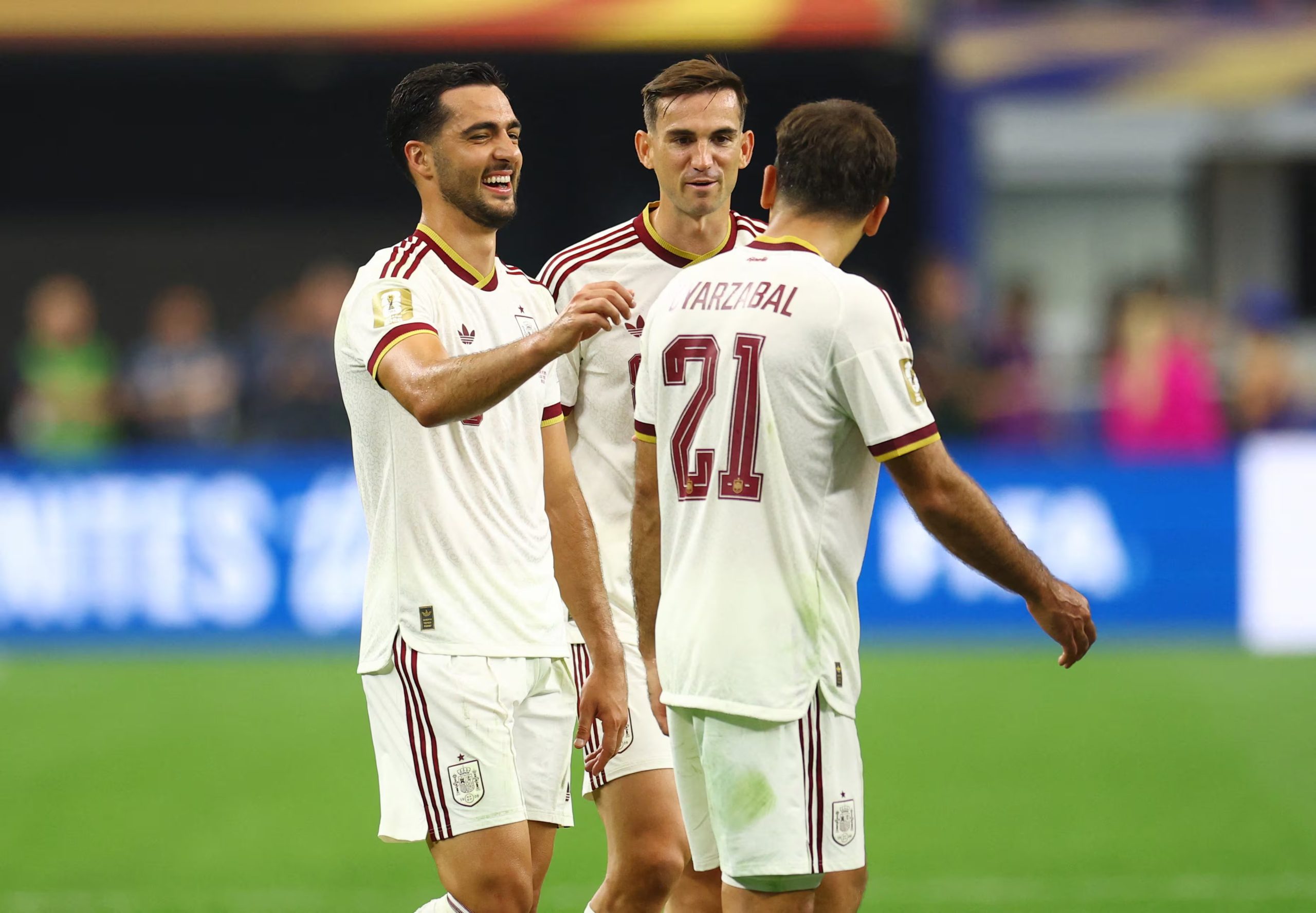 Soccer Football - FIFA World Cup 2026 - Round of 16 - Portugal v Spain - Dallas Stadium, Arlington, Texas, U.S. - July 6, 2026 Spain's Mikel Merino, Spain's Mikel Oyarzabal and Fabian Ruiz celebrate after the match as Spain qualify for the quarter finals of the World Cup REUTERS/Hannah Mckay