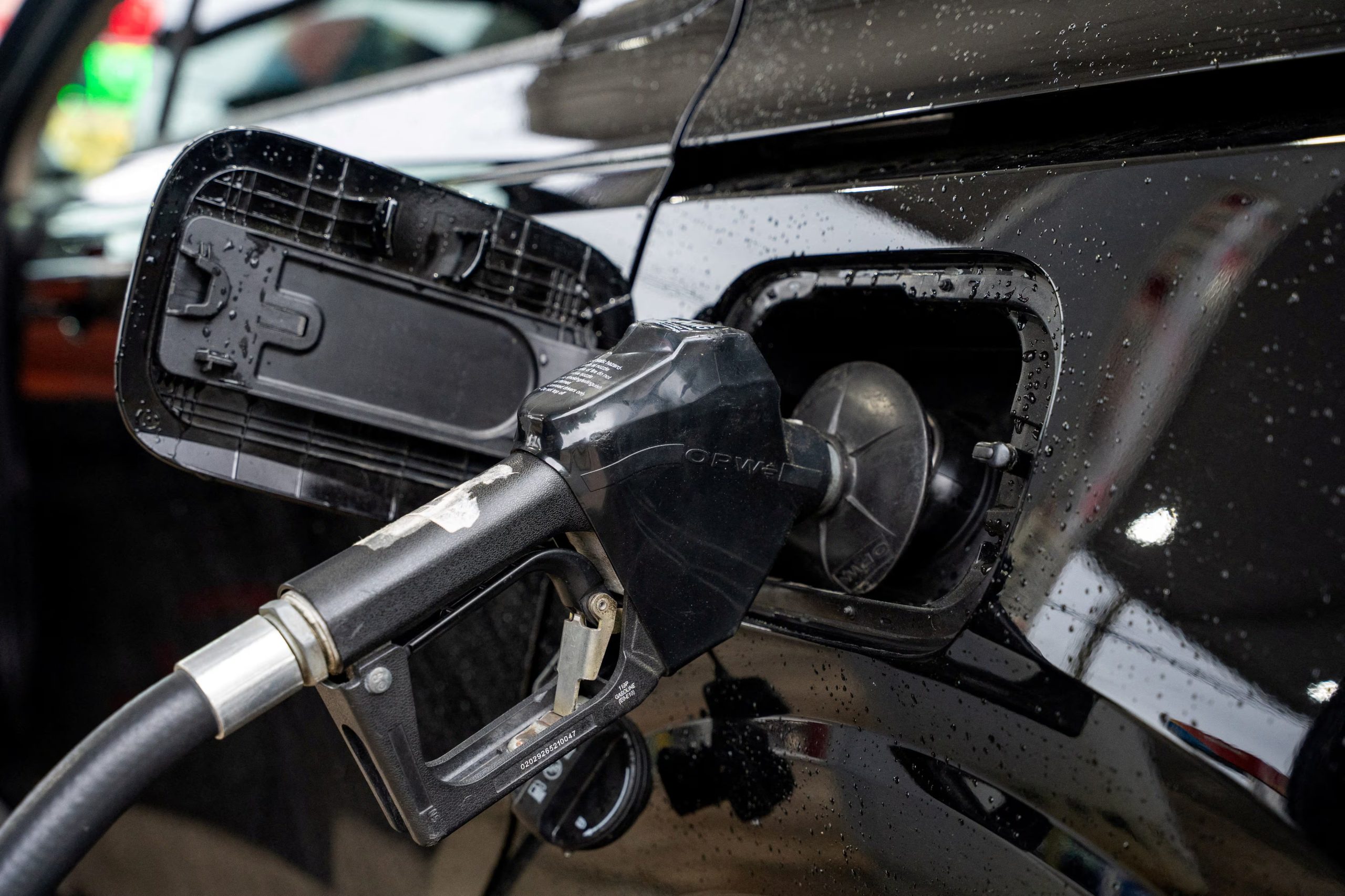 FILE PHOTO: A car is filled with gasoline at a Sunoco gas station ahead of the Memorial Day weekend in Philadelphia, Pennsylvania, U.S. May, 21 2026. REUTERS/Seth Herald/File Photo