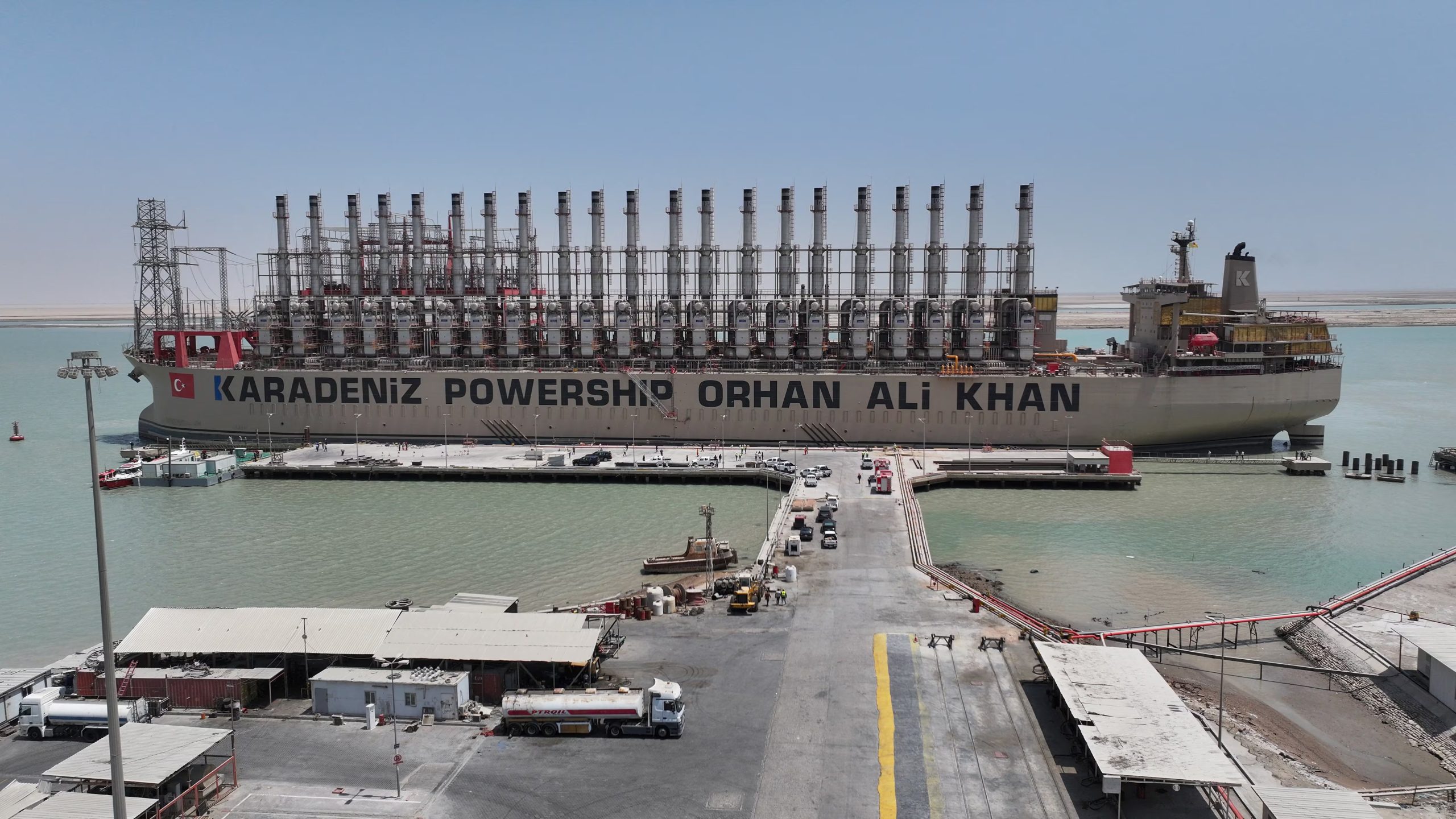 A drone view shows the Karadeniz Powership Orhan Ali Khan, a floating power plant, docked at the port of Umm Qasr in Basra, Iraq, August 21, 2025. REUTERS/Mohammed Aty