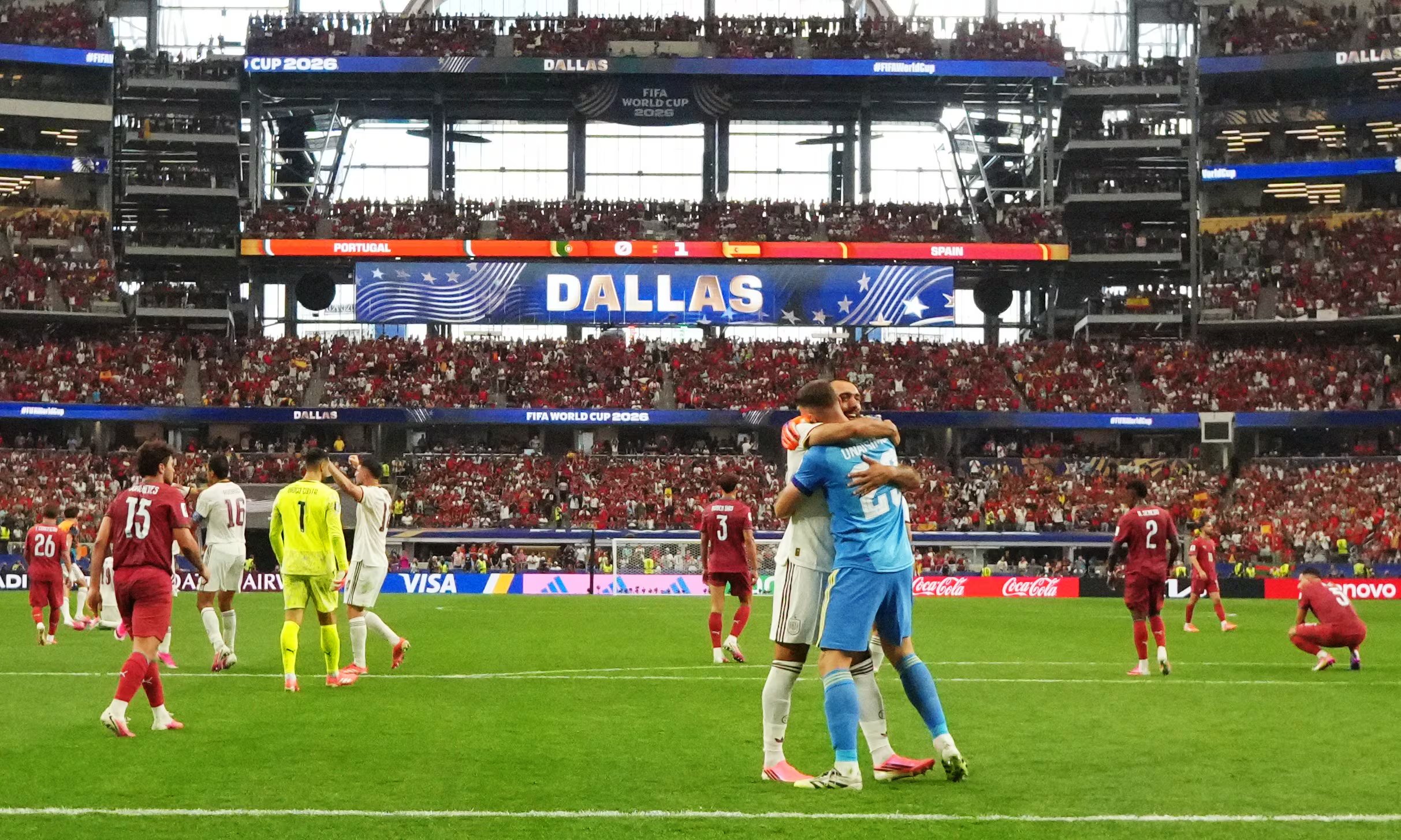 Soccer Football - FIFA World Cup 2026 - Round of 16 - Portugal v Spain - Dallas Stadium, Arlington, Texas, U.S. - July 6, 2026 Spain's Unai Simon and Borja Iglesias celebrate after the match REUTERS/Omar Aziz
