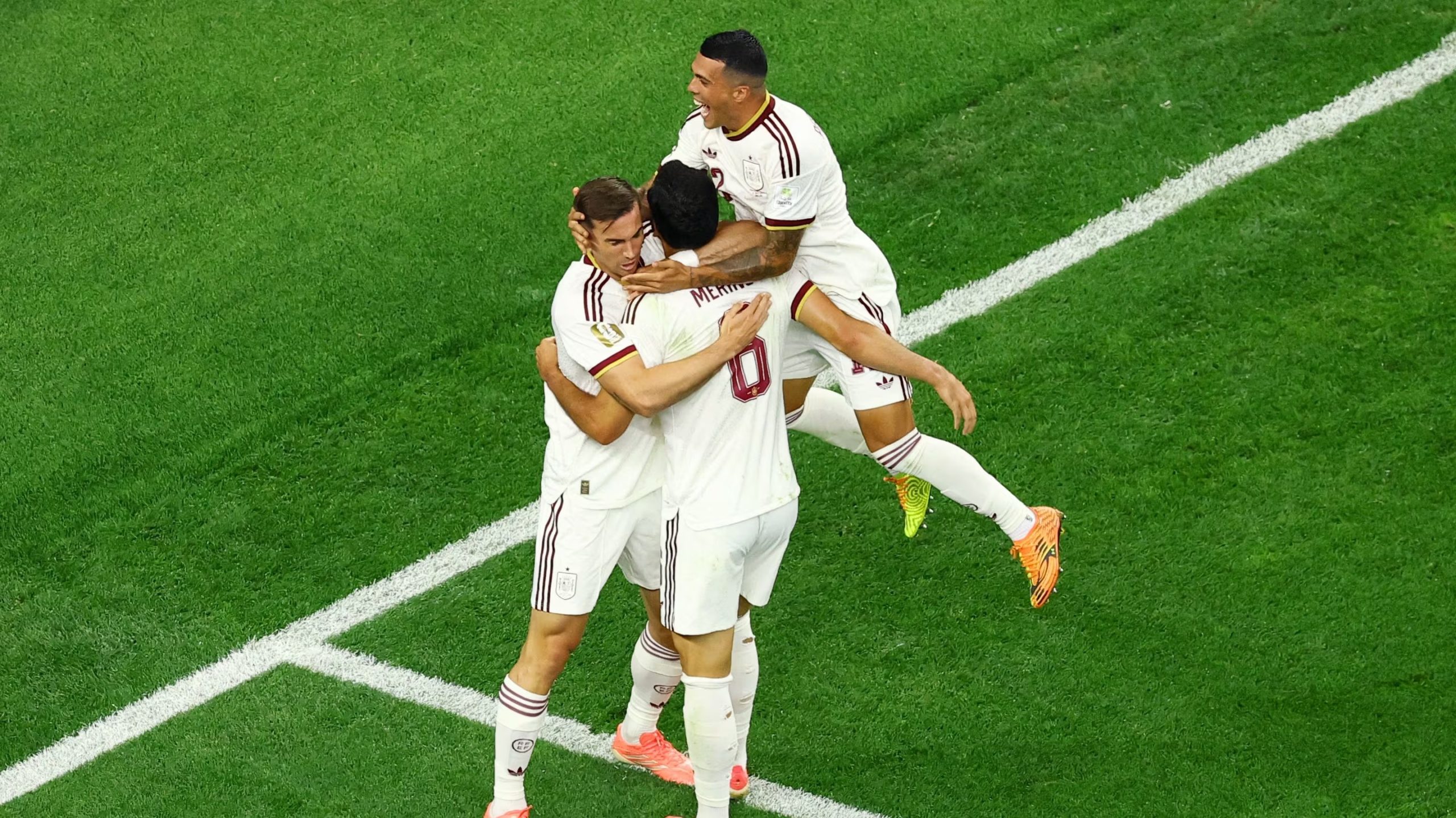 Spain's Mikel Merino celebrates scoring their first goal with Fabian Ruiz and Pedro Porro REUTERS/Issei Kato