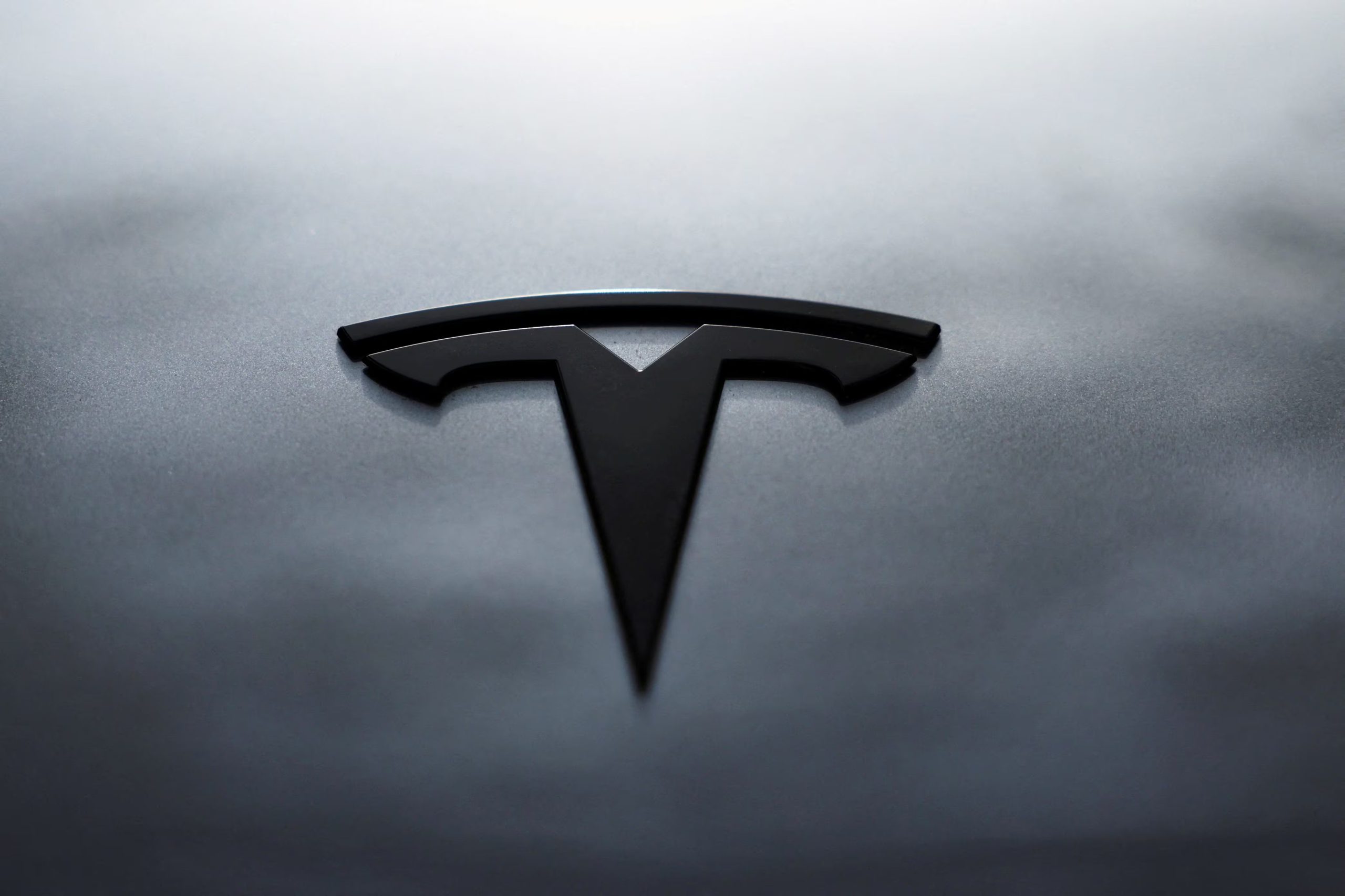 FILE PHOTO: The logo of Tesla is seen on a Tesla Model Y during Tesla Inc.'s official launch in Bogota, Colombia, November 20, 2025. REUTERS/Luisa Gonzalez/File Photo