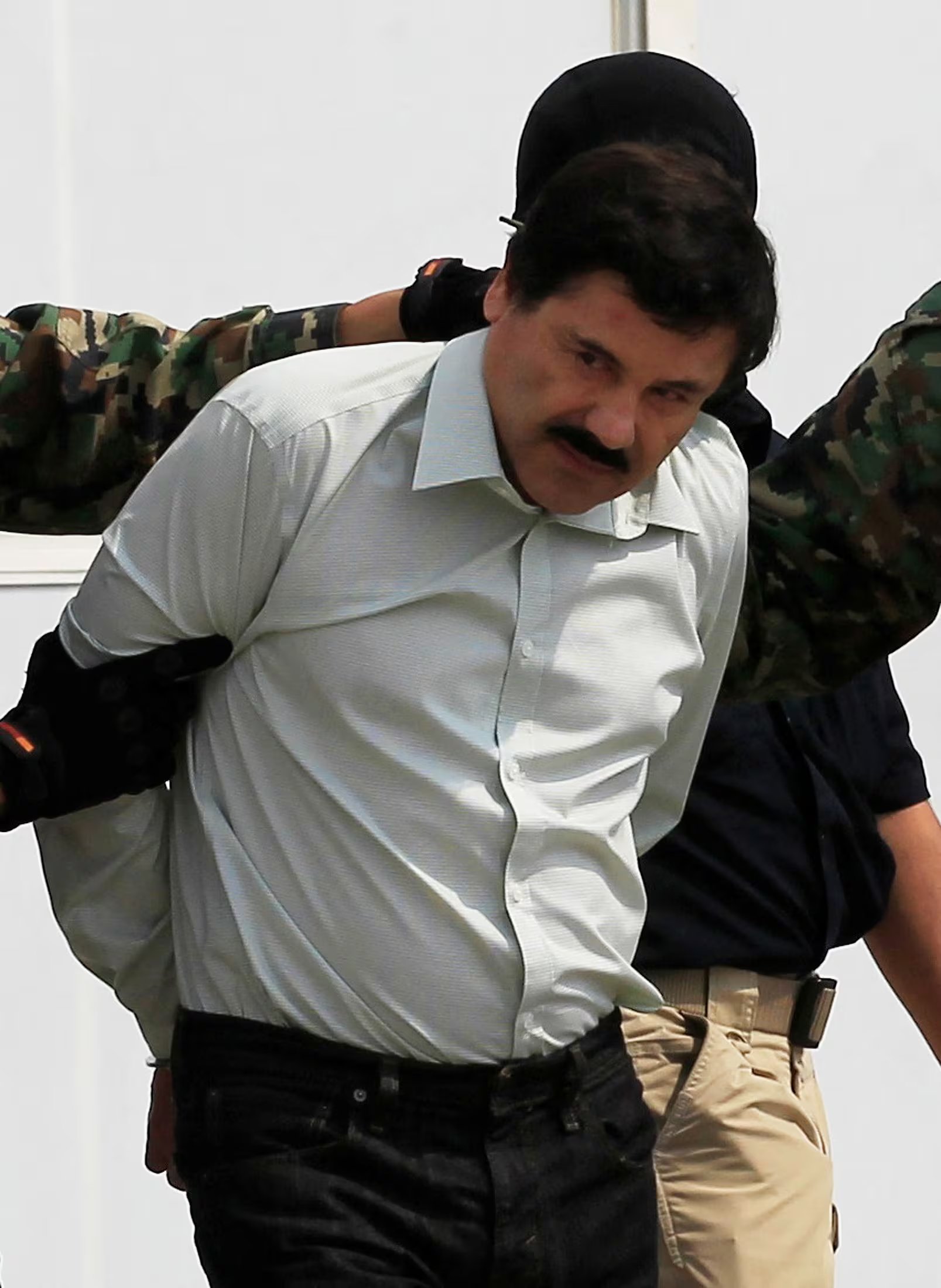 El Chapo, detenido en 2014. To match Special Report MEXICO-DRUGS/CHAPITOS REUTERS/Henry Romero/File Photo