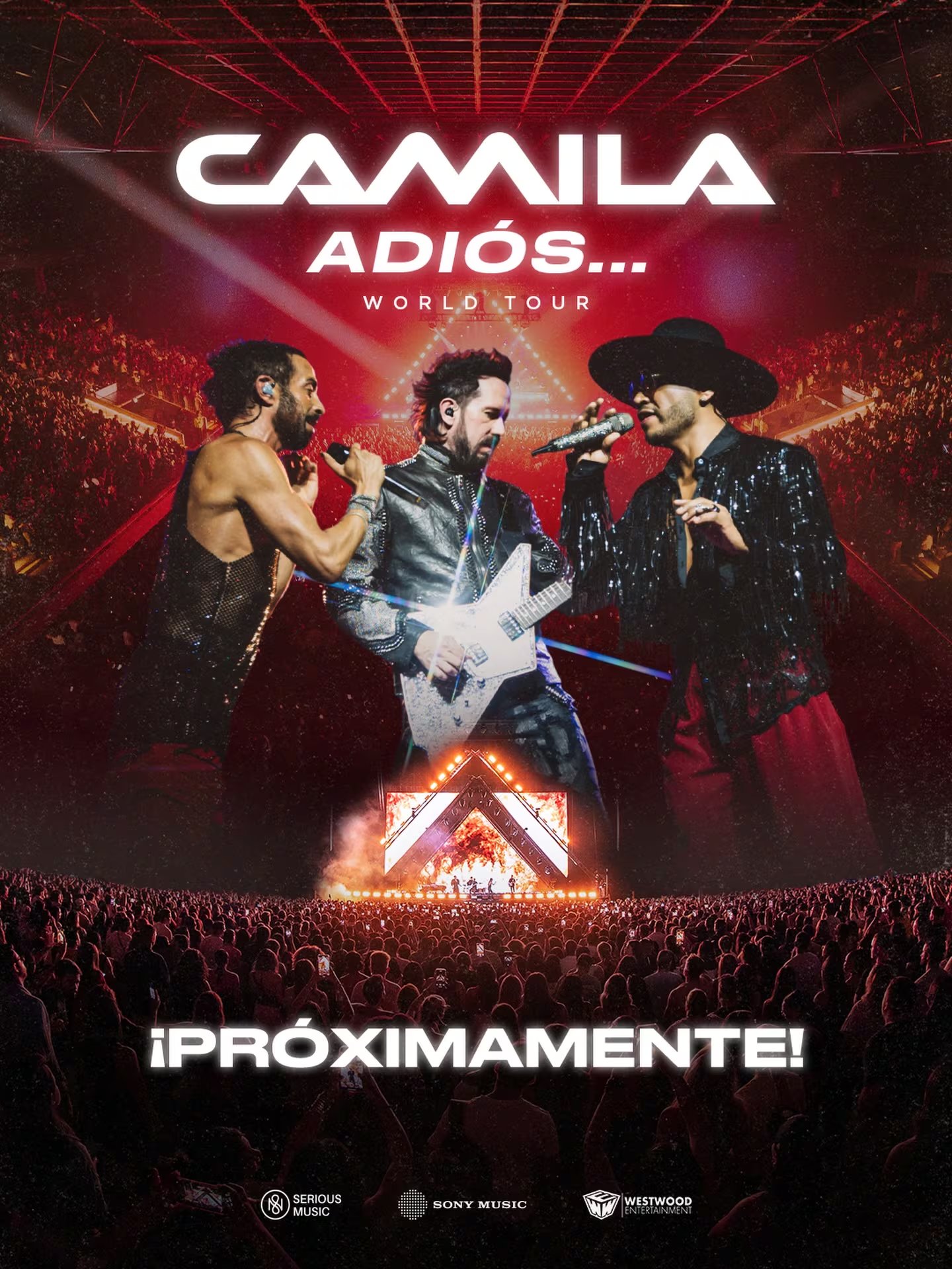 La banda mexicana Camila presenta a sus tres integrantes en el escenario durante la gira mundial 